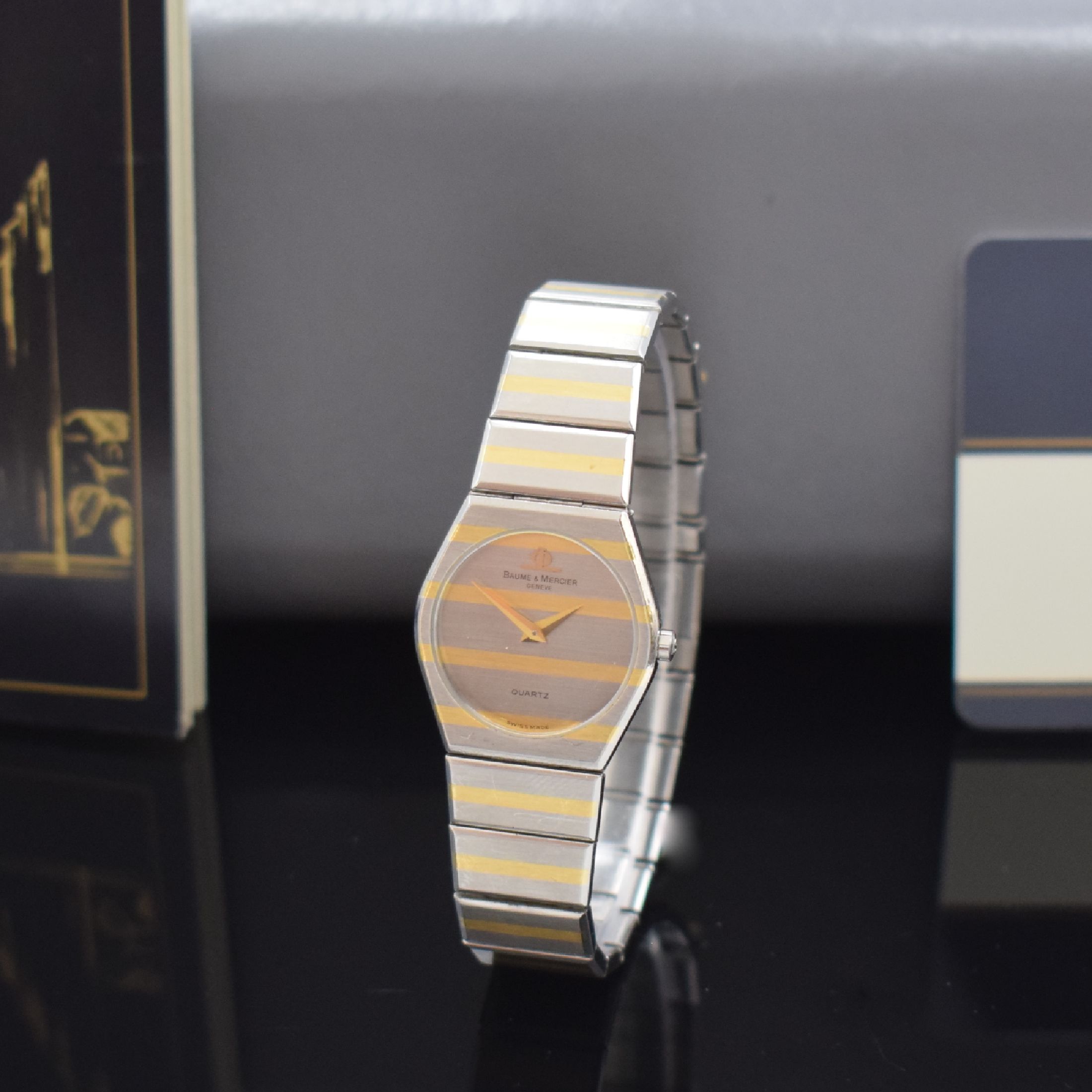 BAUME & MERCIER Damenarmbanduhr Referenz 5208.038 in Stahl/Gold, Schweiz lt. orig. Papier verk. 1987, quartz, 4-fach verschr. Geh. m. integr. Band, ...