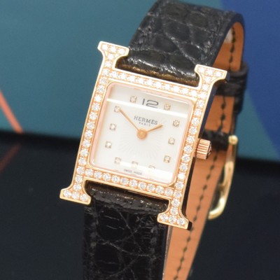 26733823a - HERMES 18k pink gold ladies wristwatch series Heure H reference HH1.271, original leather strap with original 18k pink gold buckle, quartz, bezel lavish diamonds set, case back screwed-down 4-times, mother of pearl dial with 11 diamond indices, display of hours & minutes, measures approx. 30 x 25 mm, Hermes storage back enclosed, unworn stock, condition 1-2