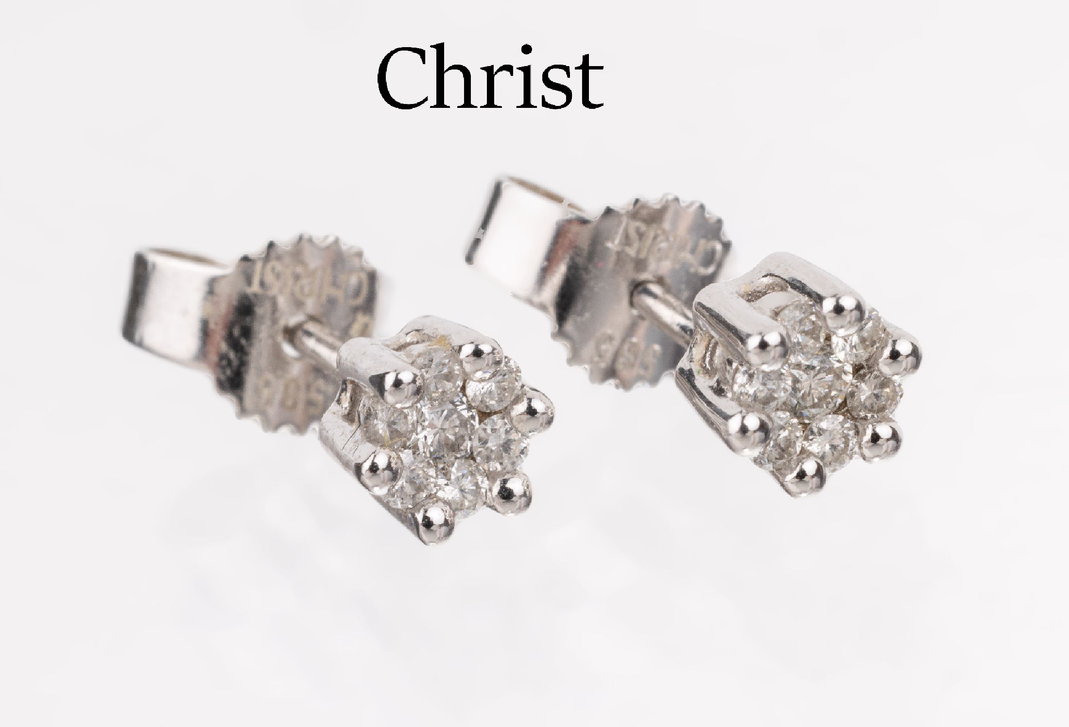 Paar 14 kt Gold CHRIST Brillant-Ohrstecker, WG 585/000, 14 Brillanten zus. ca. 0.16 ct Weiß/si