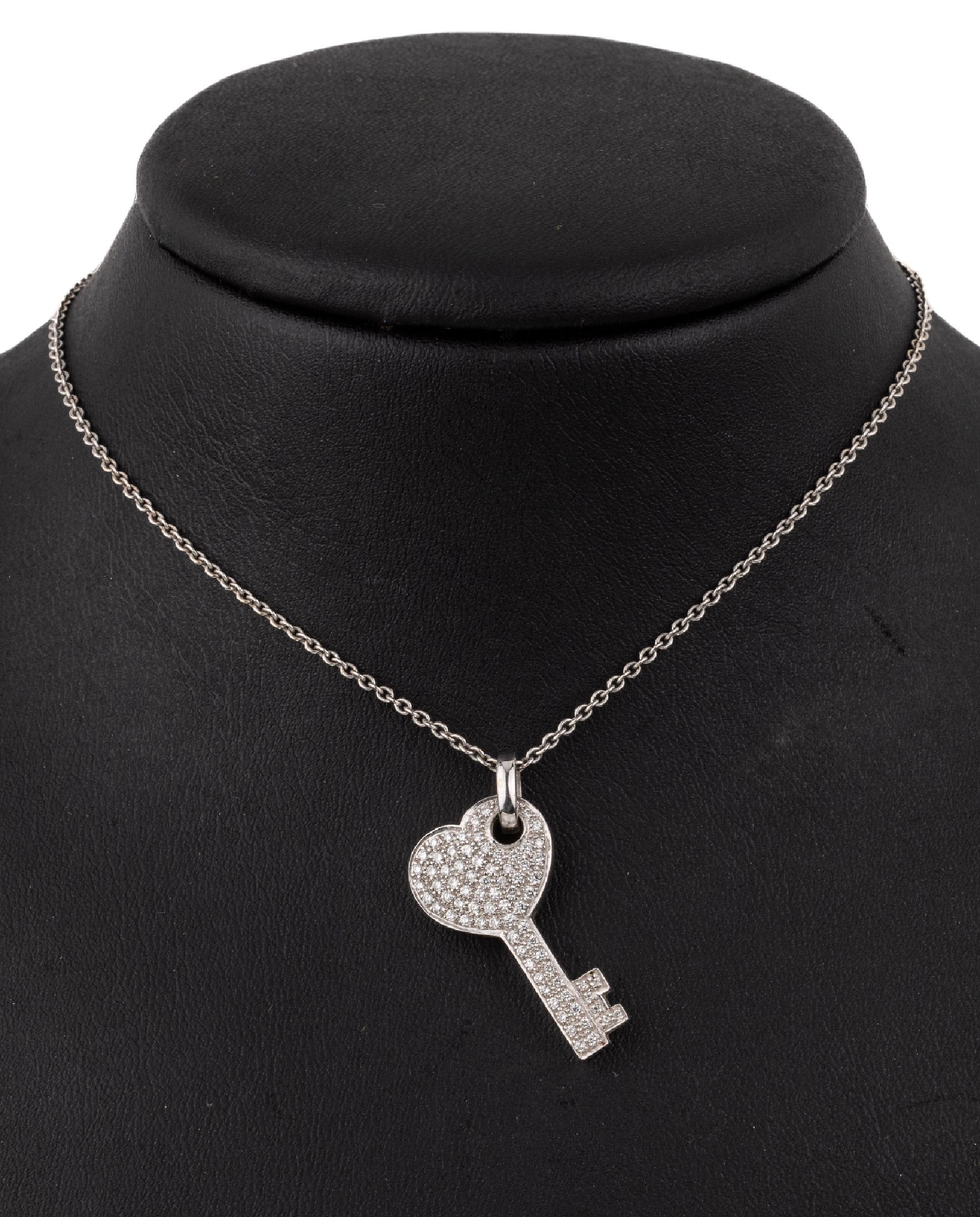 14 kt Gold Brillant-Anhänger "Schlüssel", WG 585/000, Brillanten zus. ca. 0.40 ct Weiß/si, an Kette, WG 585/000, L. ca. 42 cm, ...