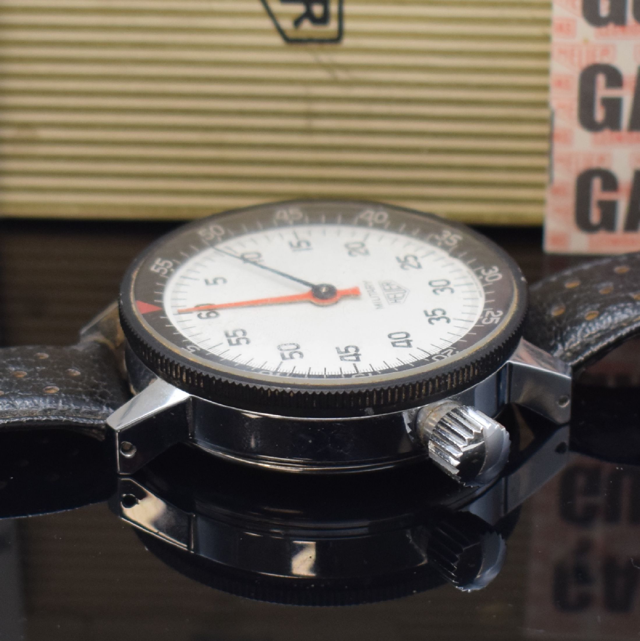 Detail c: HEUER Military sehr seltene Armband-Stoppuhr als Full-Set, Schweiz um 1969, Handaufzug, verchromtes Geh., Stahlboden aufgedr., orig. Lederband, vers. ...