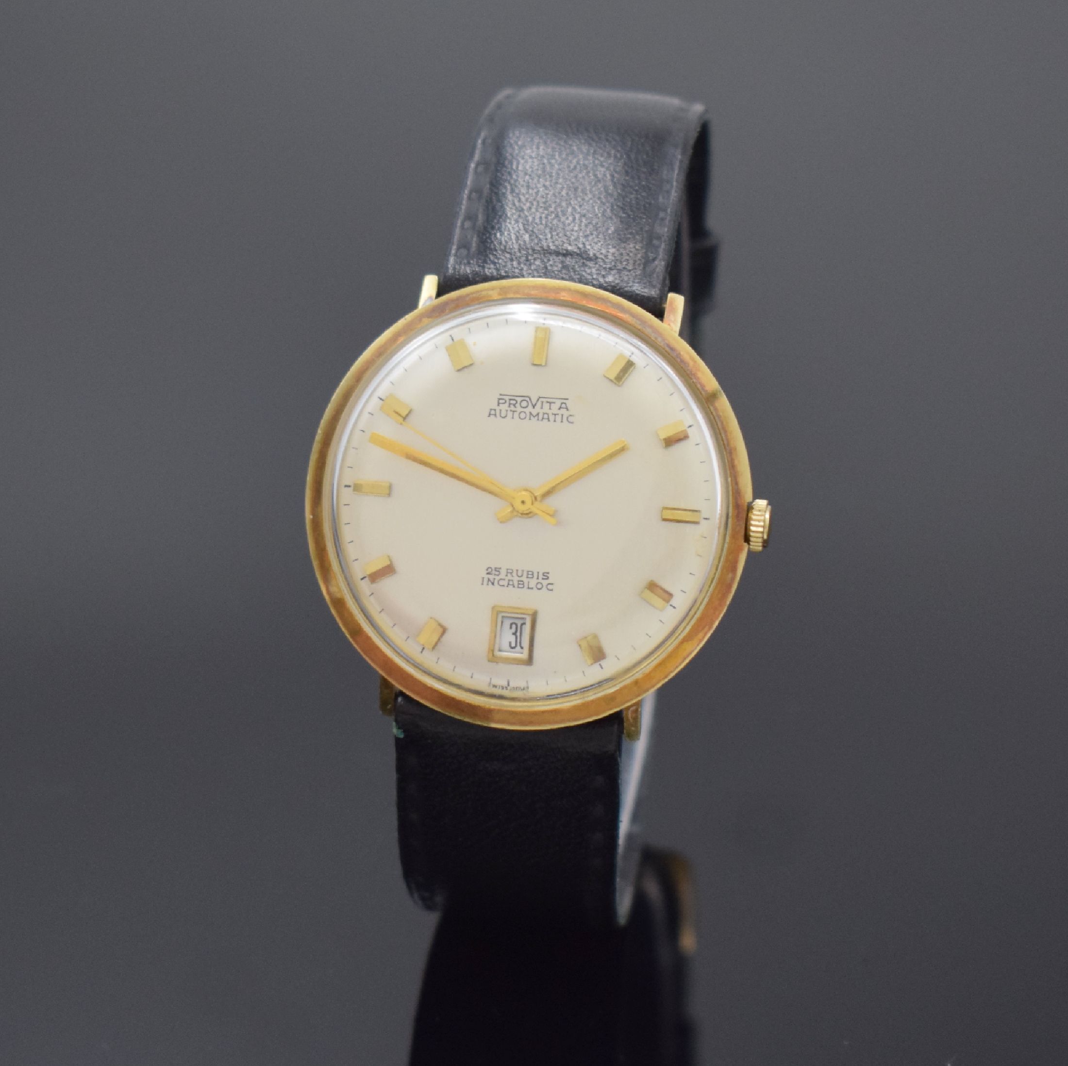 PROVITA Herrenarmbanduhr in GG 585/000, Schweiz 1960er Jahre, Automatik, Boden aufgedr., silb. Zifferbl. m. gold. Std.-Ind., gold. Zeiger, Datum b. ...