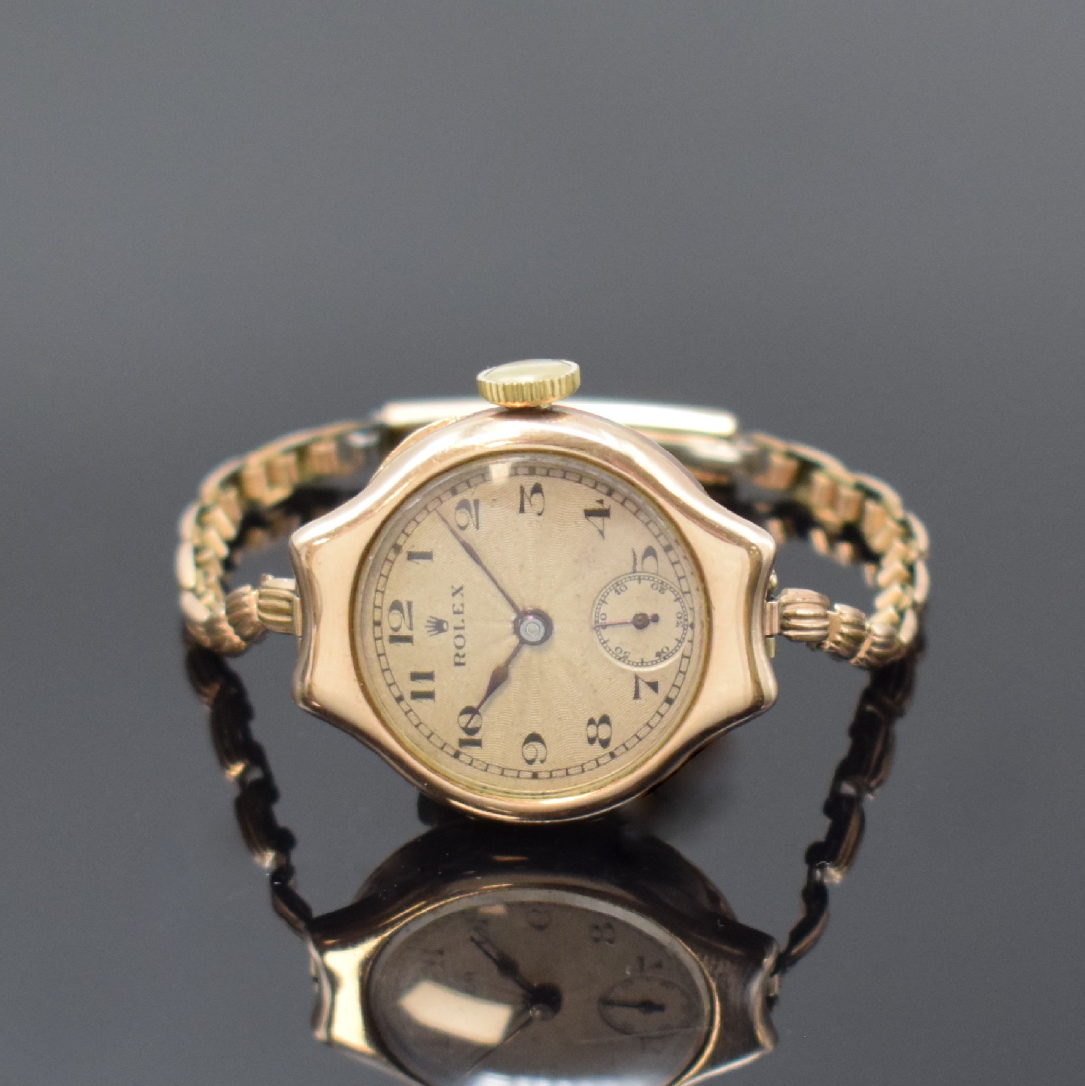 ROLEX frühe Armbanduhr in RG 375/000, Schweiz für den englischen Markt um 1915, Handaufzug, sign. Geh. dell., verg. Band, Scharnierboden innen ...