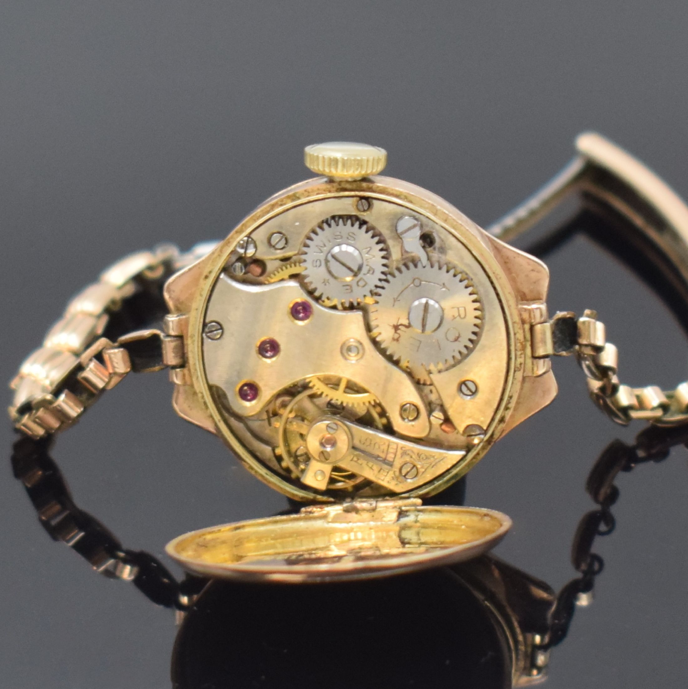 Detail e: ROLEX frühe Armbanduhr in RG 375/000, Schweiz für den englischen Markt um 1915, Handaufzug, sign. Geh. dell., verg. Band, Scharnierboden innen ...