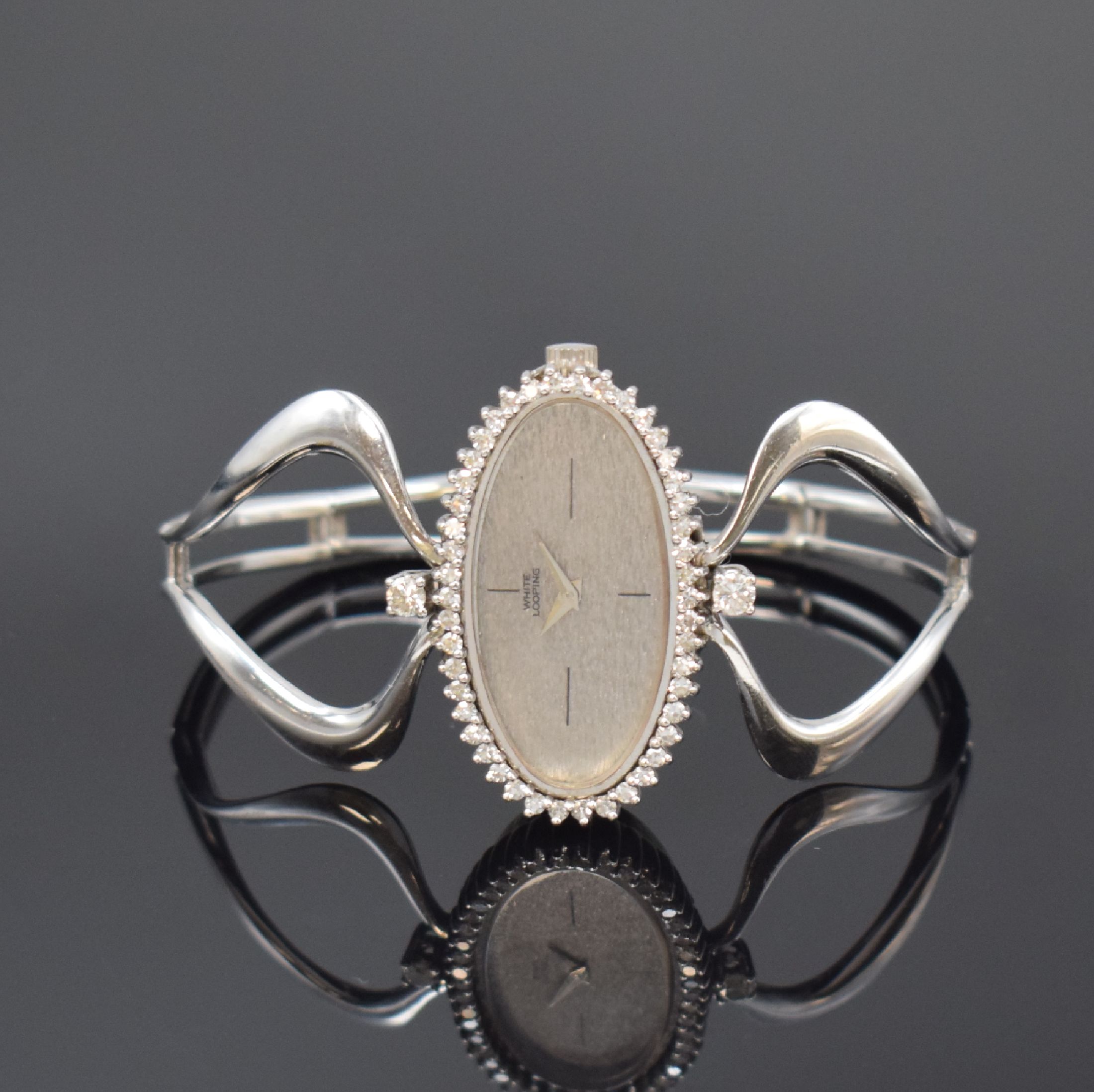 WHITE LOOPING ausgefallene Designerarmbanduhr in WG 750/000 mit Diamanten, Schweiz um 1976, Handaufzug, Boden mit Widmungsgravur aufgedr., Lünette ...