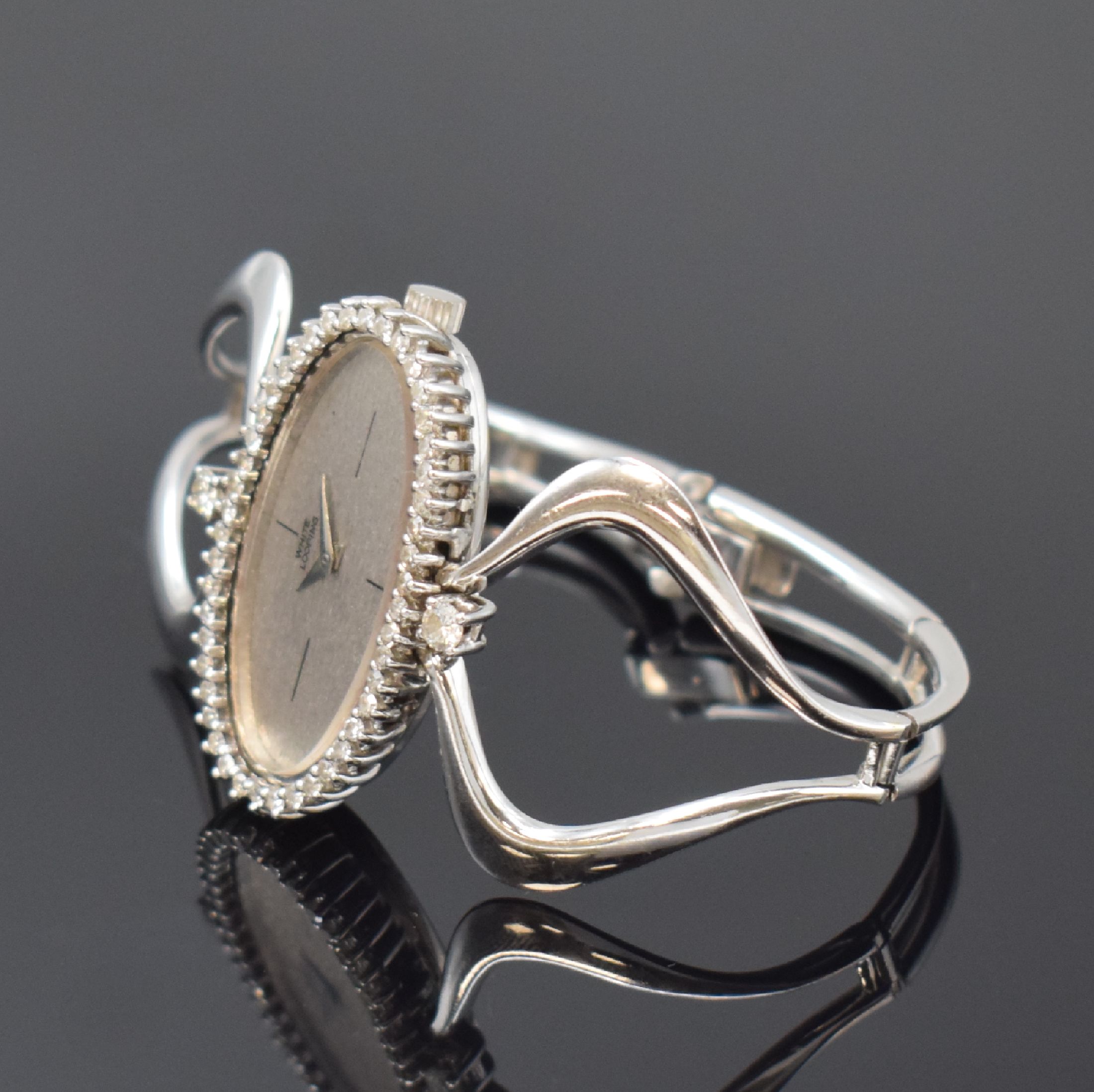 Detail b: WHITE LOOPING ausgefallene Designerarmbanduhr in WG 750/000 mit Diamanten, Schweiz um 1976, Handaufzug, Boden mit Widmungsgravur aufgedr., Lünette ...