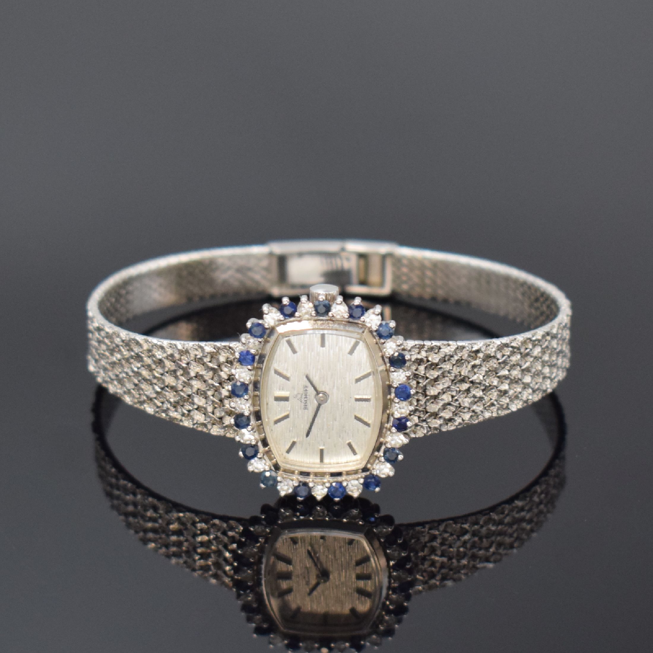 BISCHOFF Damenarmbanduhr in WG 585/000 mit Diamanten und Saphiren, Schweiz um 1970, Handaufzug, Boden aufgedr., Lünette aufw. m. Diamanten u. ...
