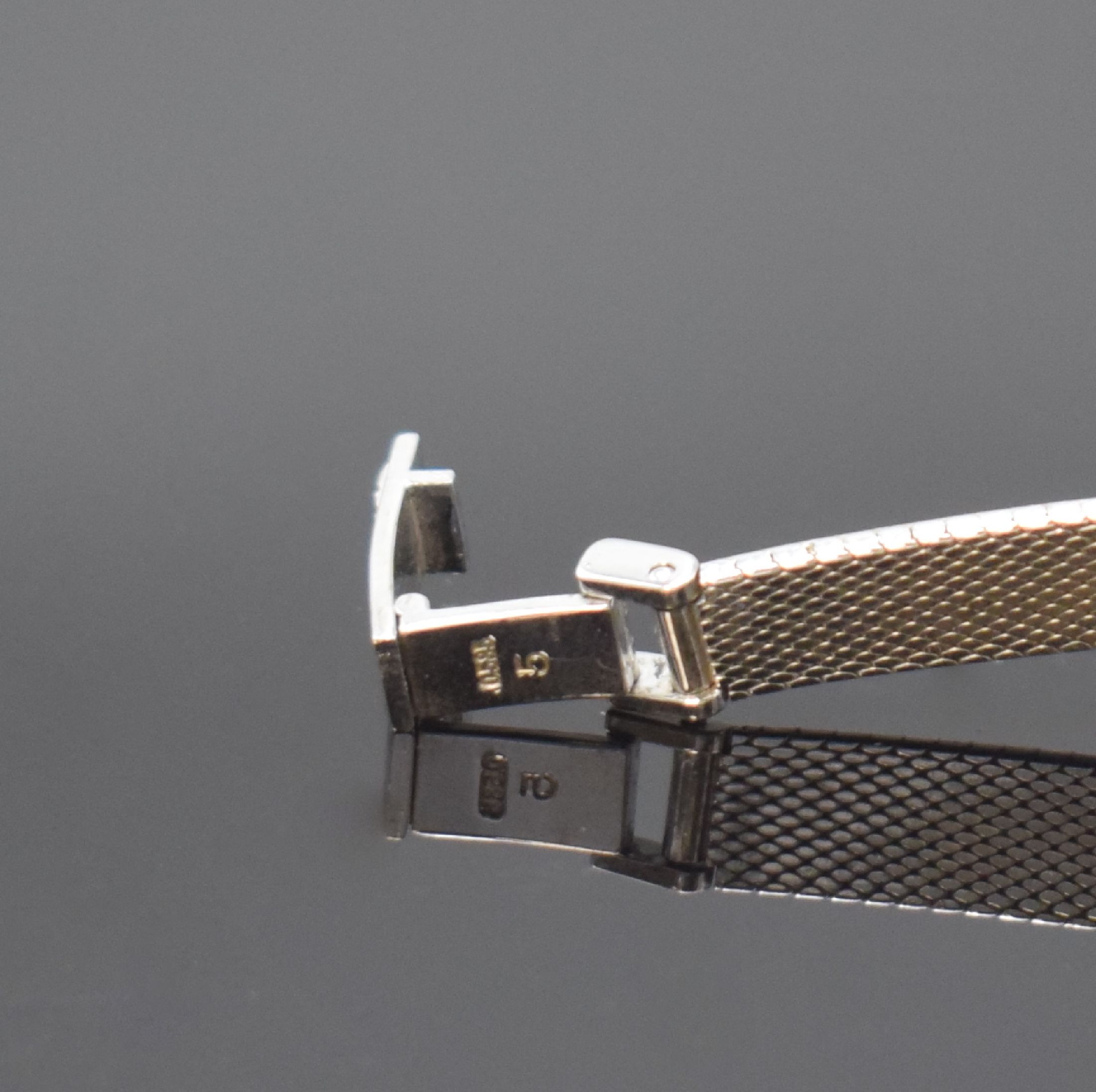 Detail d: TISSOT Damenarmbanduhr in WG 585/000 mit Diamanten, Schweiz um 1970, Handaufzug, Boden aufgedr., Lünette aufw. m. Diamanten bes., vers. Zifferbl. m. ...