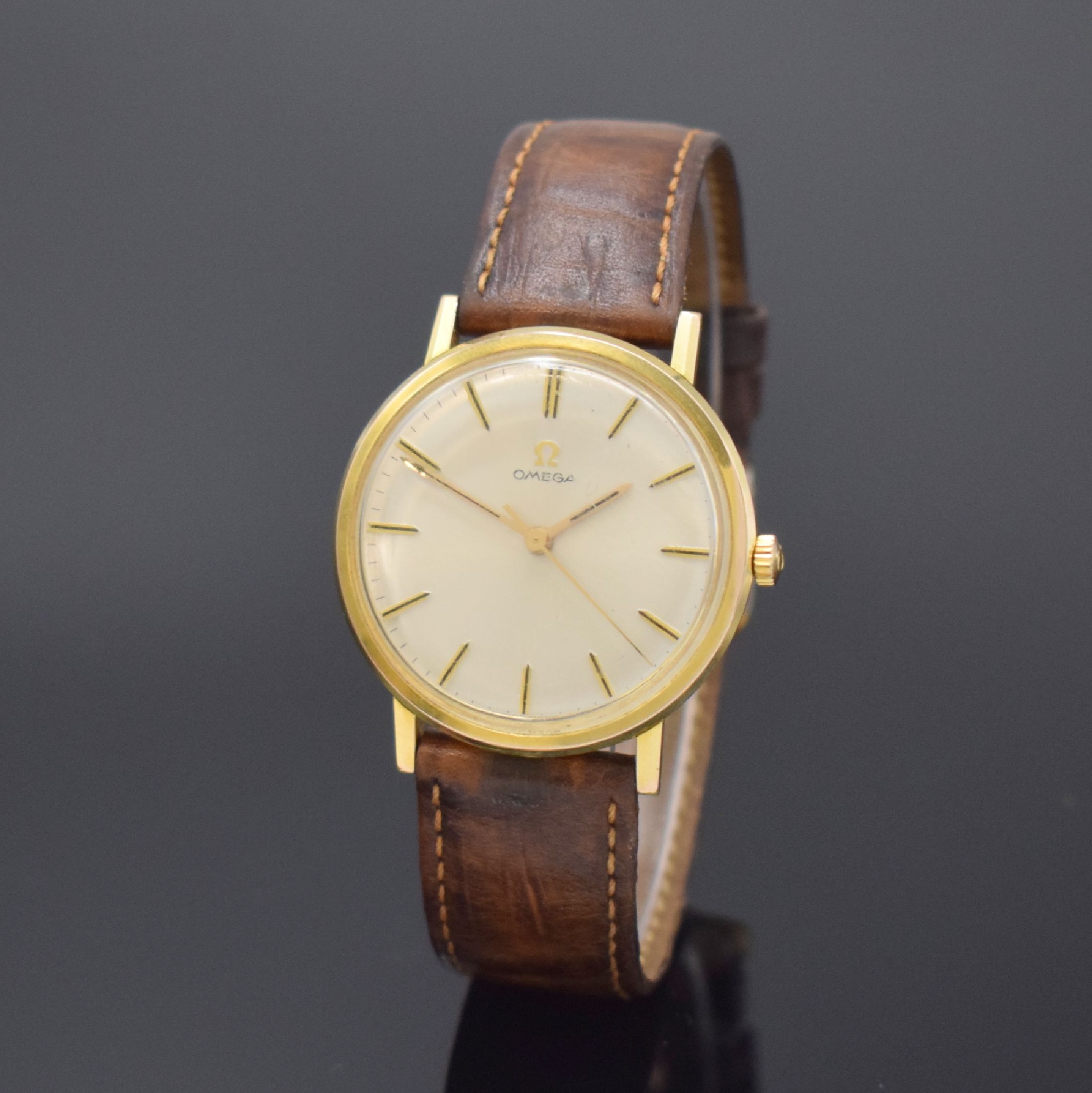 OMEGA Herrenarmbanduhr Referenz 131.019, Handaufzug, Schweiz um 1965, verg. Geh., Edelstahlboden aufgedr., silb. Zifferblatt m. aufges. Indizes, ...