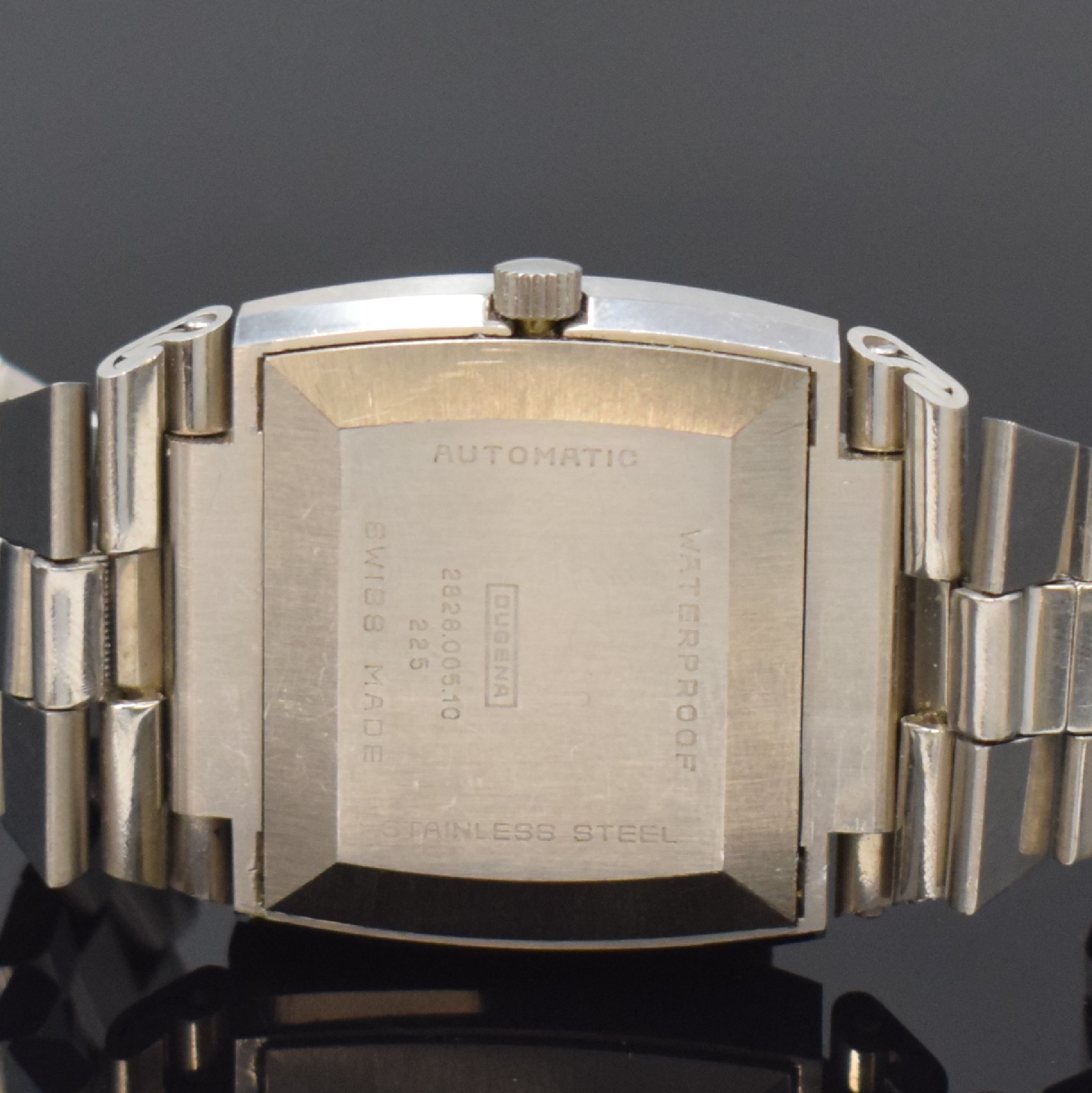Detail c: DUGENA Herrenarmbanduhr in Edelstahl, Automatik, Schweiz um 1970, massives Edelstahlgeh. inkl. integriertem Gliederband m. Faltschl., silb. Zifferbl. ...
