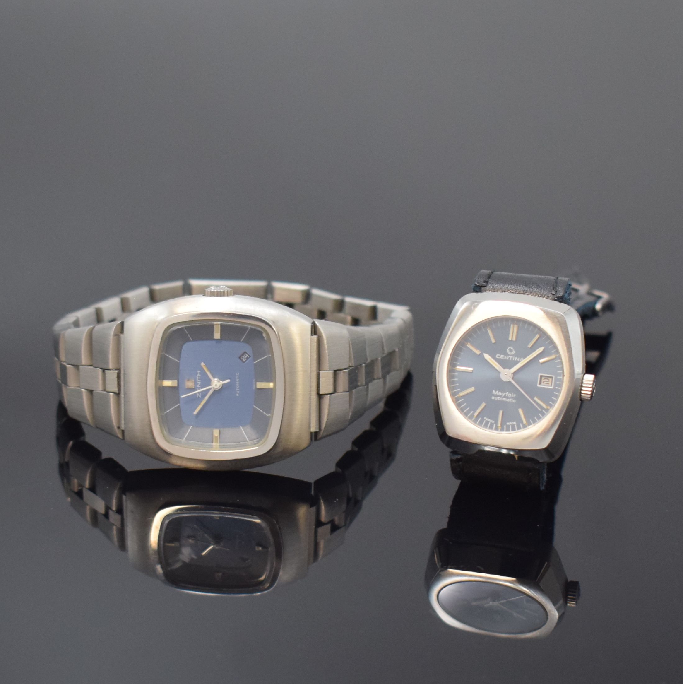 Konvolut aus 2 Armbanduhren, beide Automatik Schweiz um 1970/80, beide Edelstahl m. verschraubten Böden, 1 x Zenith, orig. Gliederband, blaues ...