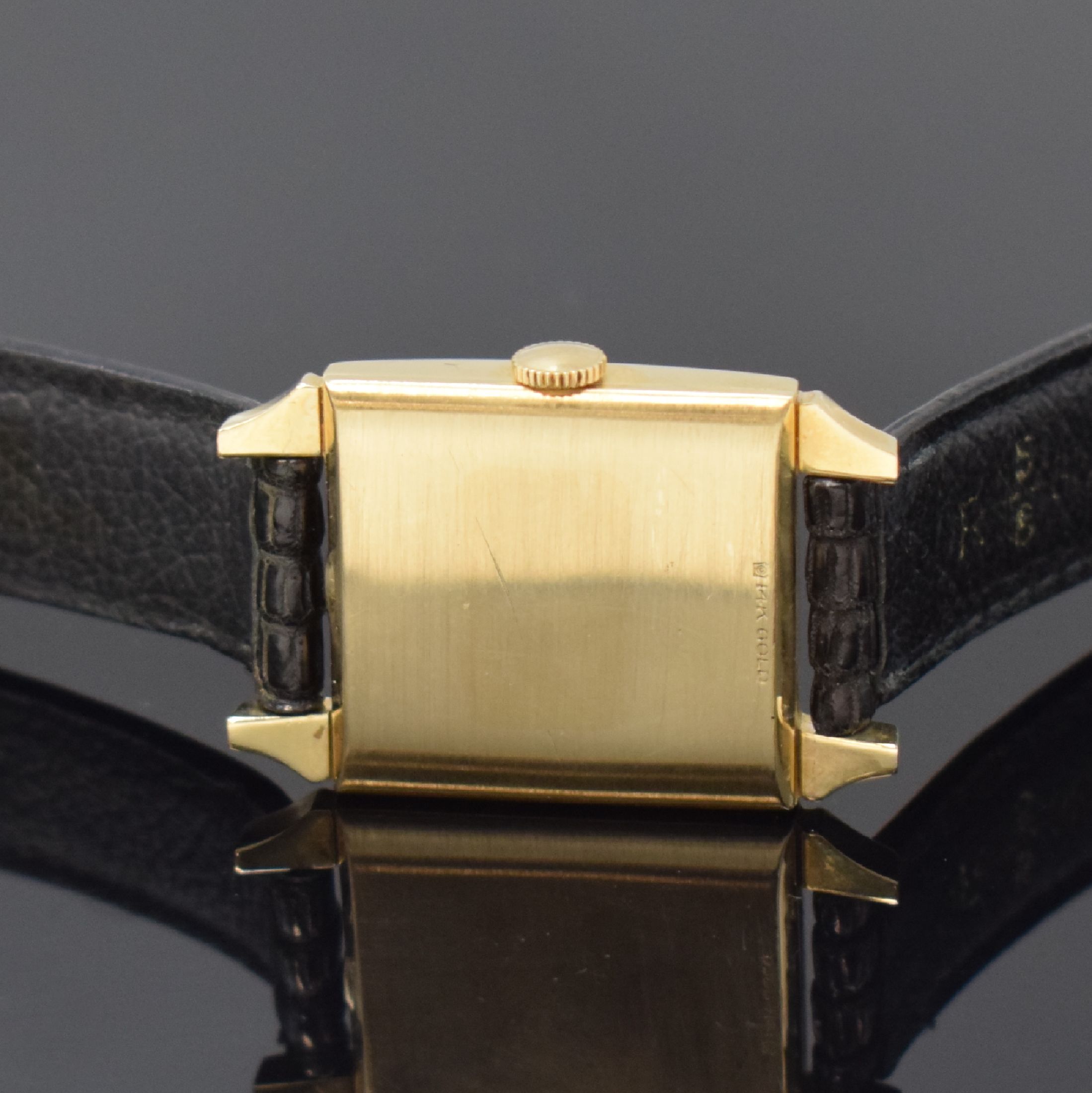 Detail c: WITTNAUER rechteckige Armbanduhr in GG 14k, USA / Schweiz um 1955, Handaufzug, 2-tlg. Geh., Boden aufgedr., Lünette m. grav. röm. Std.-Zahlen u. ...