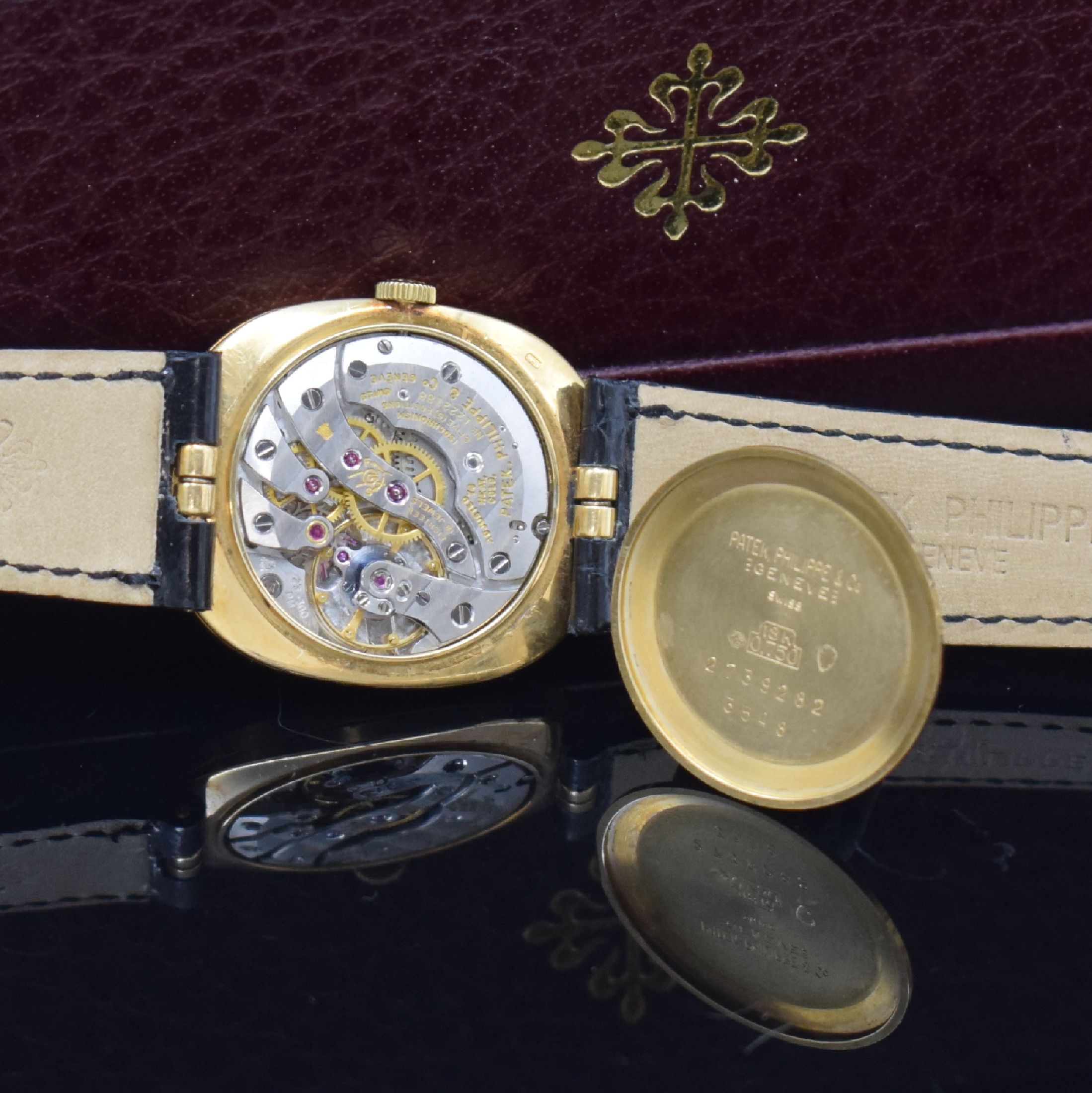 Detail e: PATEK PHILIPPE Ellipse d´Or Armbanduhr in GG 750/000 Referenz 3548, Schweiz um 1985, Handaufzug, ovales, 3-tlg. Geh., Boden und Glasrand aufgedr., ...
