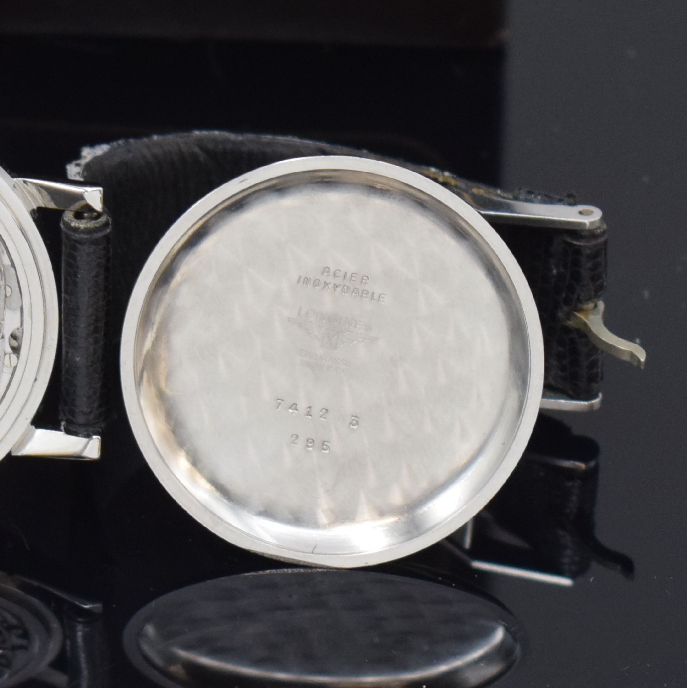 Detail f: LONGINES Flyback-Schaltradchronograph Referenz 7412, Handaufzug, Schweiz um 1966, 3-teil. Edelstahlgeh., Boden und Glasrand aufgedr., orig. Lederband ...