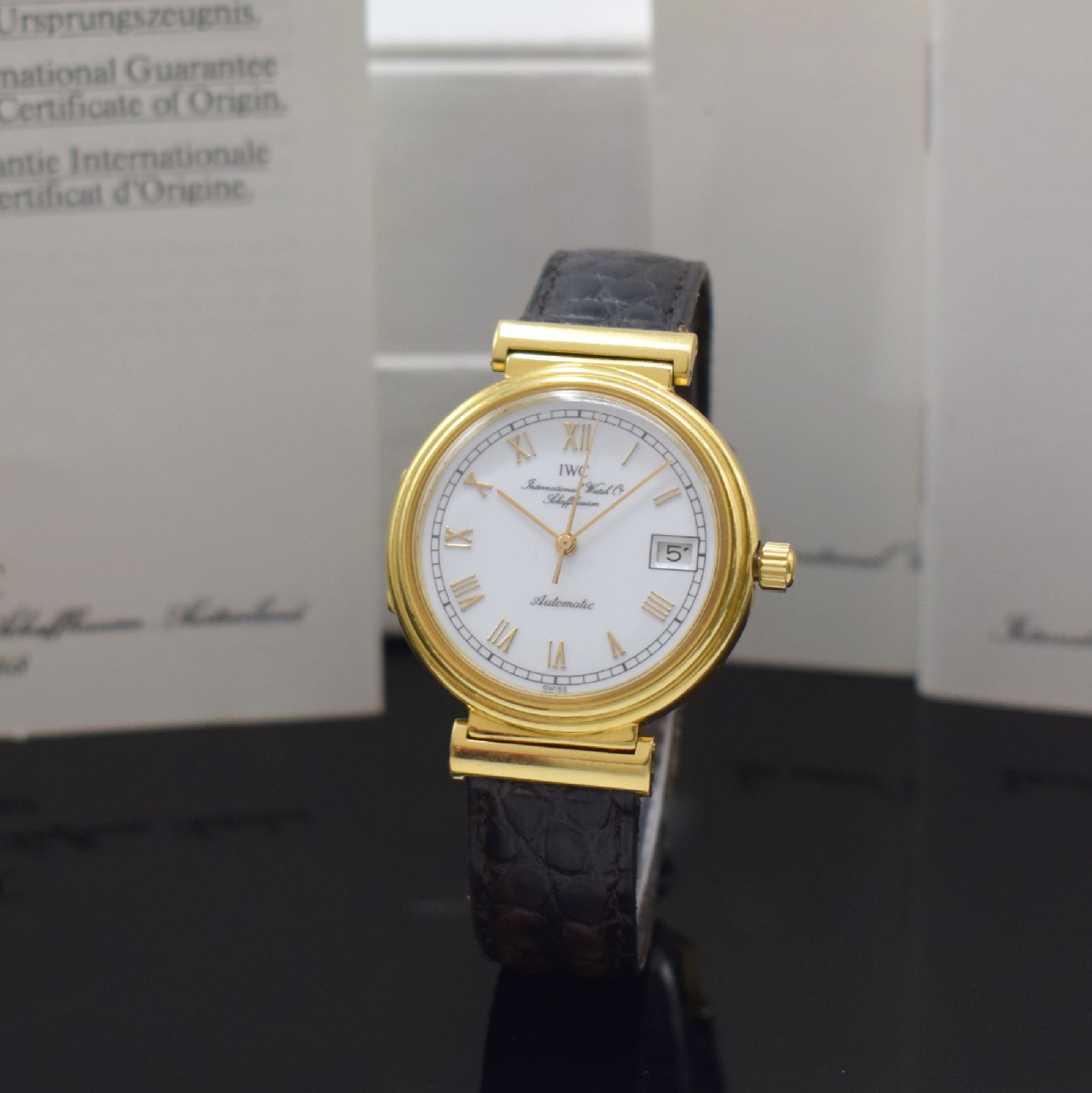 IWC Da Vinci Herrenarmbanduhr Referenz 1850 in GG 750/000, Schweiz verk. lt. beil. Pap. 1991, Automatik, aufklappbarer Scharnierboden, Lederband m. ...