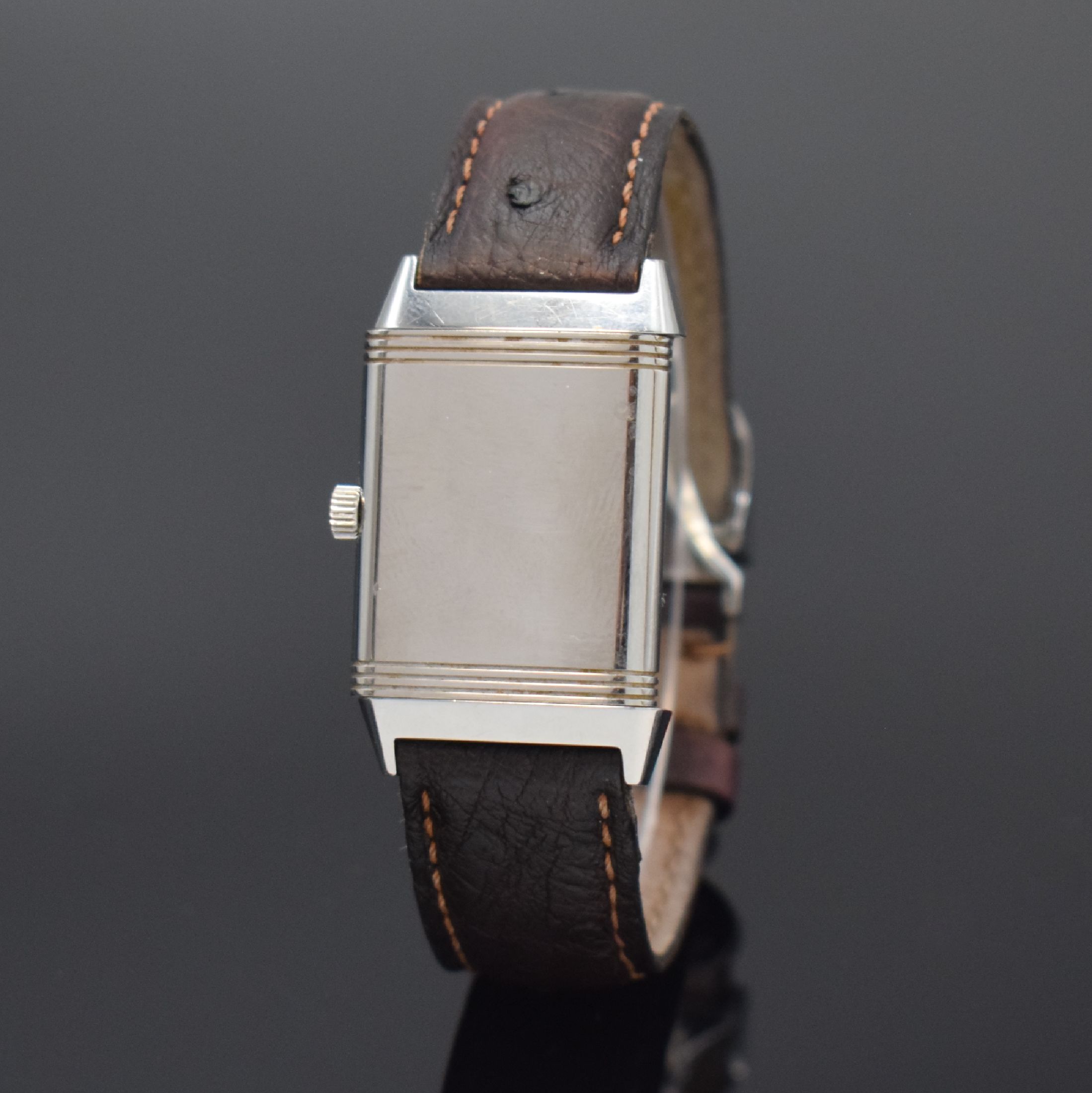 Detail c: Jaeger-LeCoultre Reverso Classic Armbanduhr in Stahl Referenz 252.8.86, Schweiz um 2005, Handaufzug, um 180 Grad drehb. Wendegeh., Lederband m. orig. ...