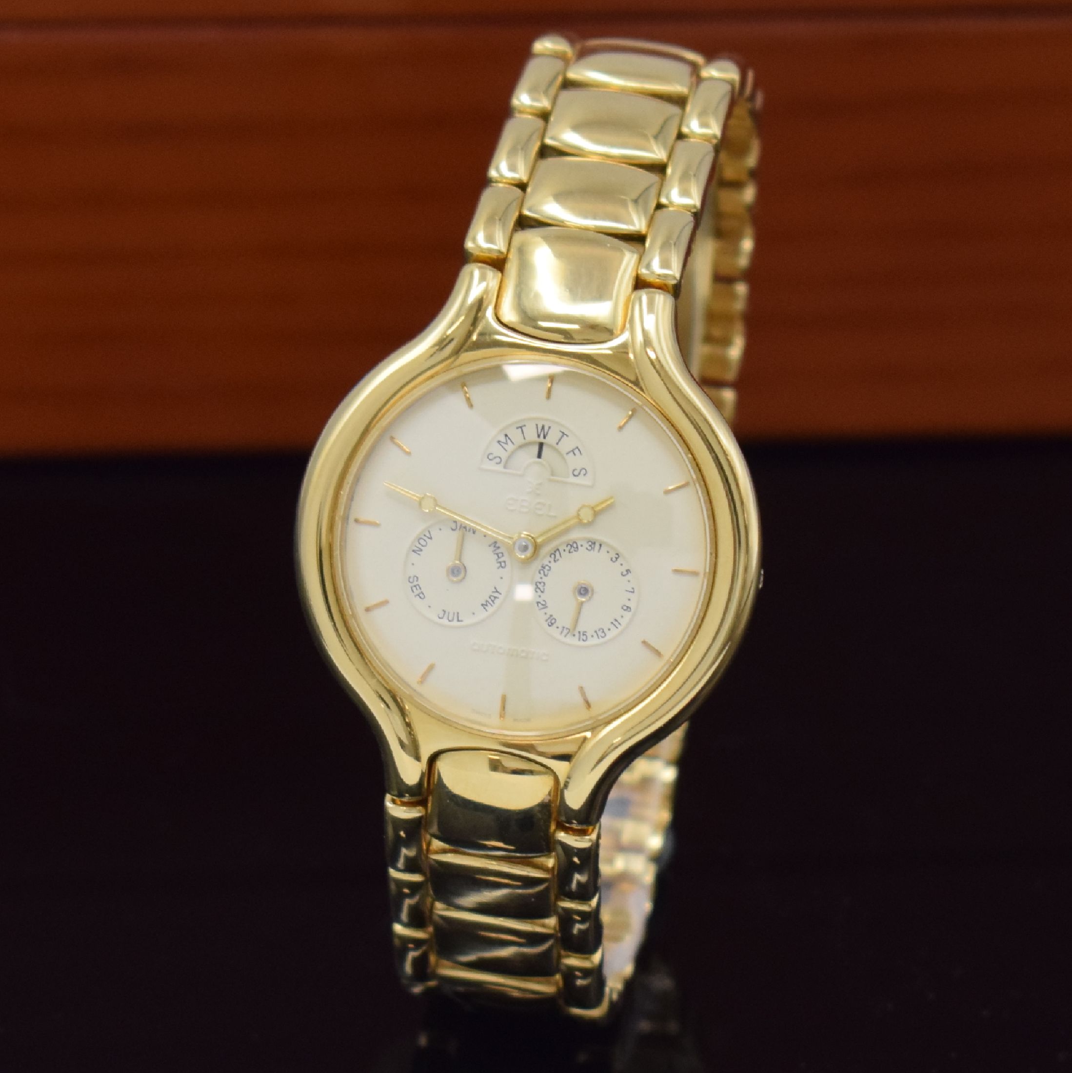 Detail a: EBEL Beluga Armbanduhr in GG 750/000 Referenz 8951950, Automatik, Schweiz um 1990, Boden 4-fach verschr., Gliederband m. Faltschl., elfenbeinfarb. ...
