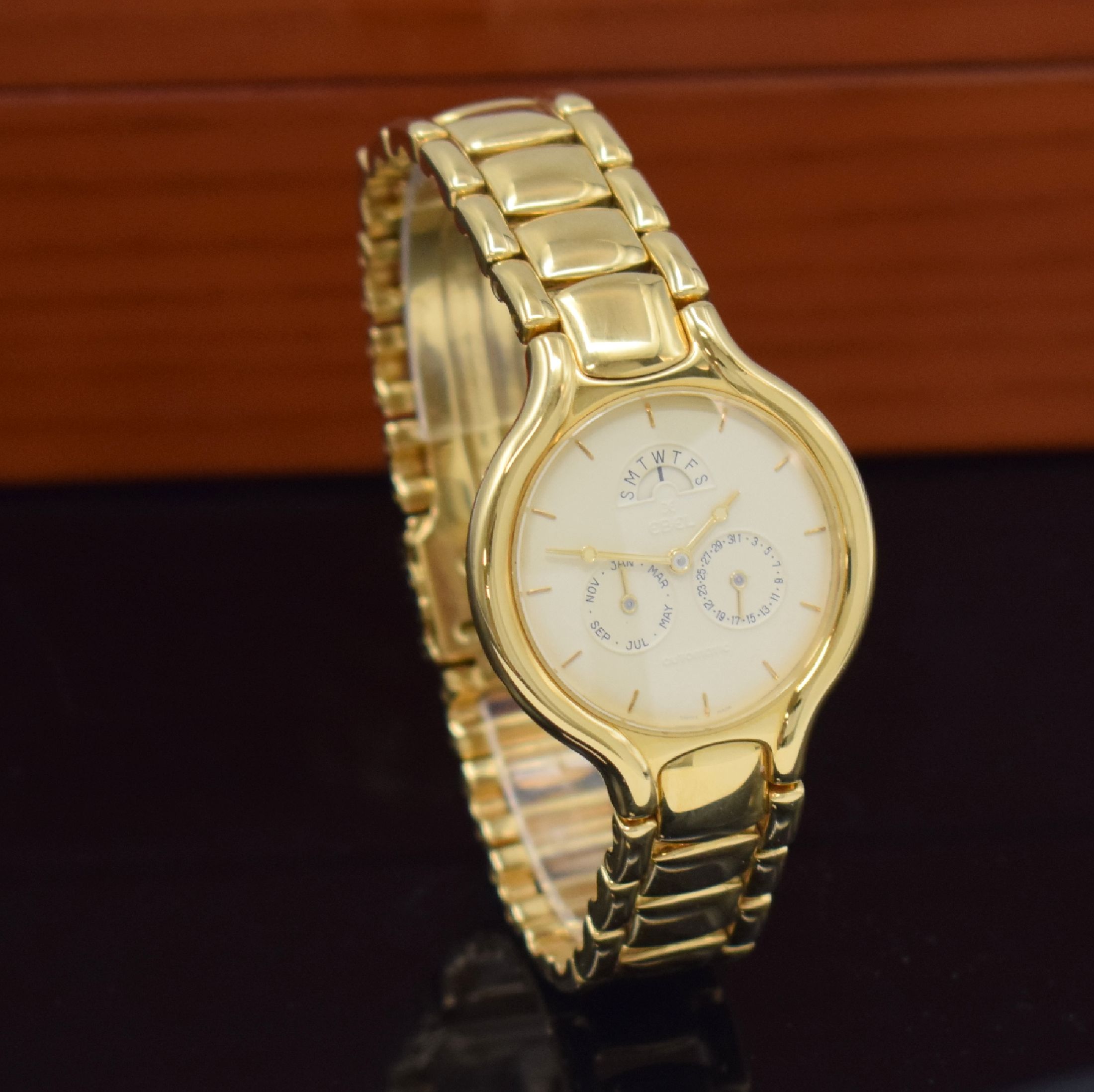 Detail b: EBEL Beluga Armbanduhr in GG 750/000 Referenz 8951950, Automatik, Schweiz um 1990, Boden 4-fach verschr., Gliederband m. Faltschl., elfenbeinfarb. ...