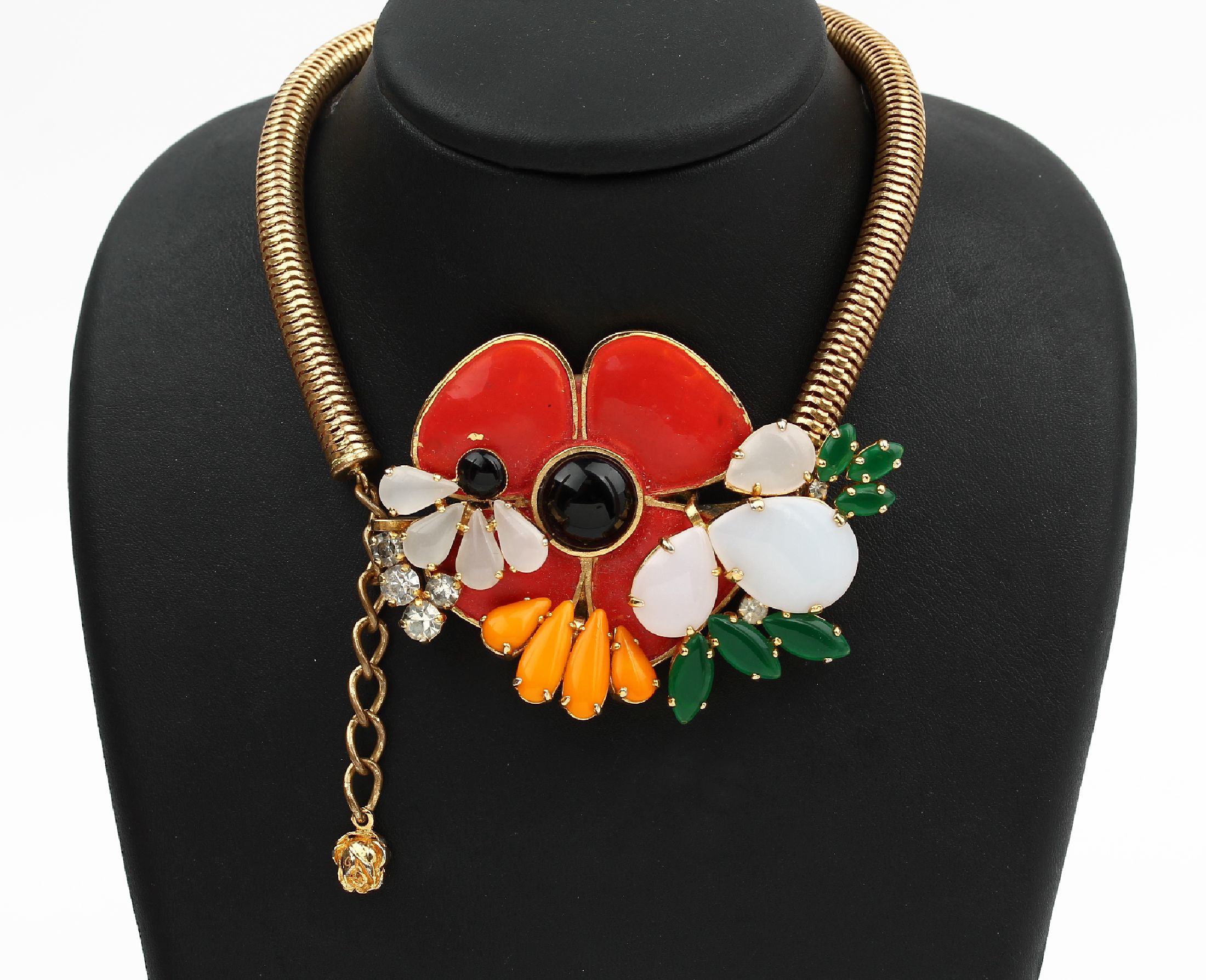 Ausgefallenes Collier, Metall verg., 1950er Jahre, Mittelteil große Blüte mit rotem und schwarzem Lack, kl. Fehlstelle mit Glassteinenin versch. ...