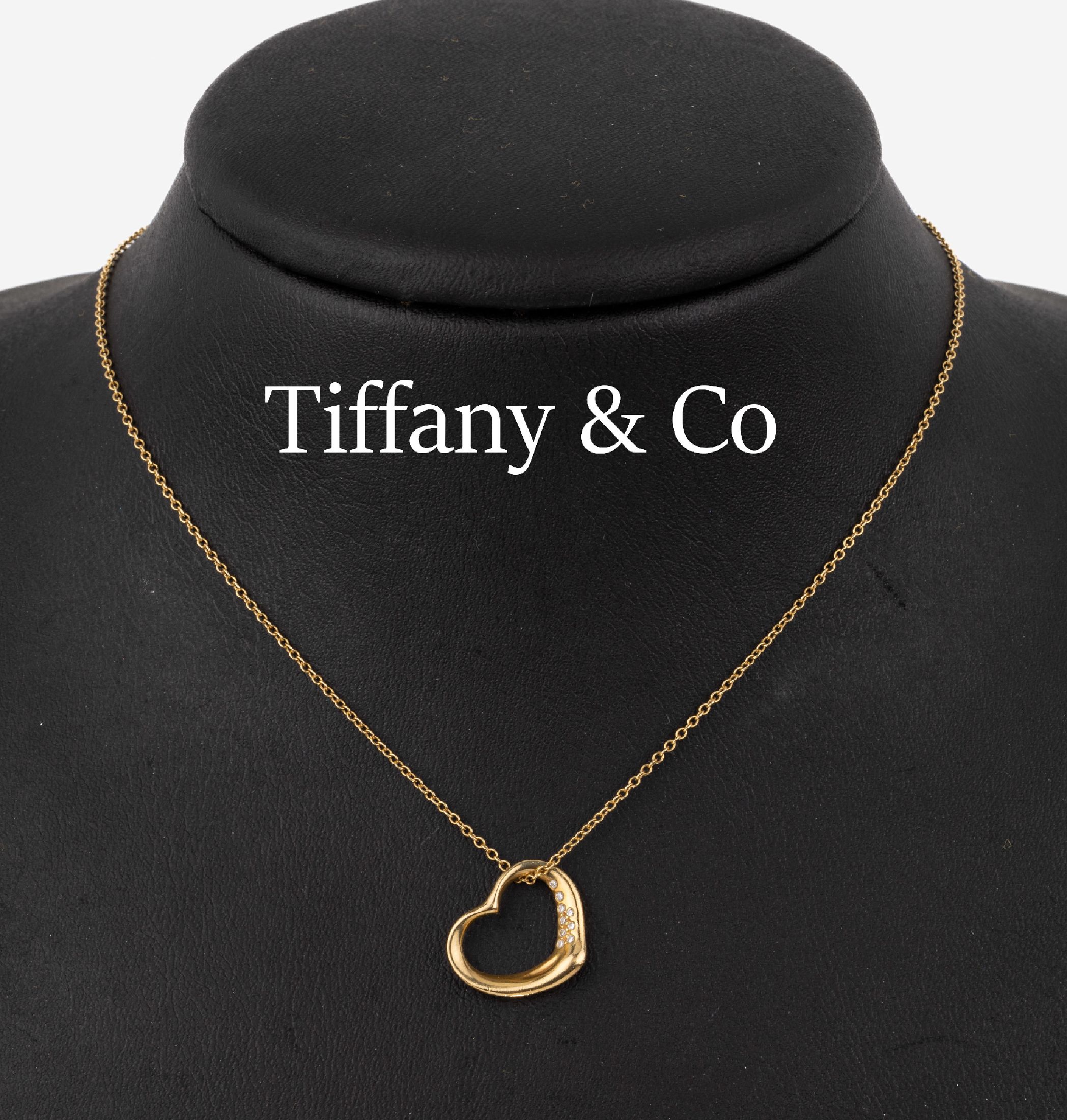 18 kt Gold TIFFANY & CO Diamant-Anhänger an Kette, GG 750/000, aus der Serie Open Heart, Entwurf Else Peretti, 9 8/8-Diamanten zus. ca. 0.05 ct ...