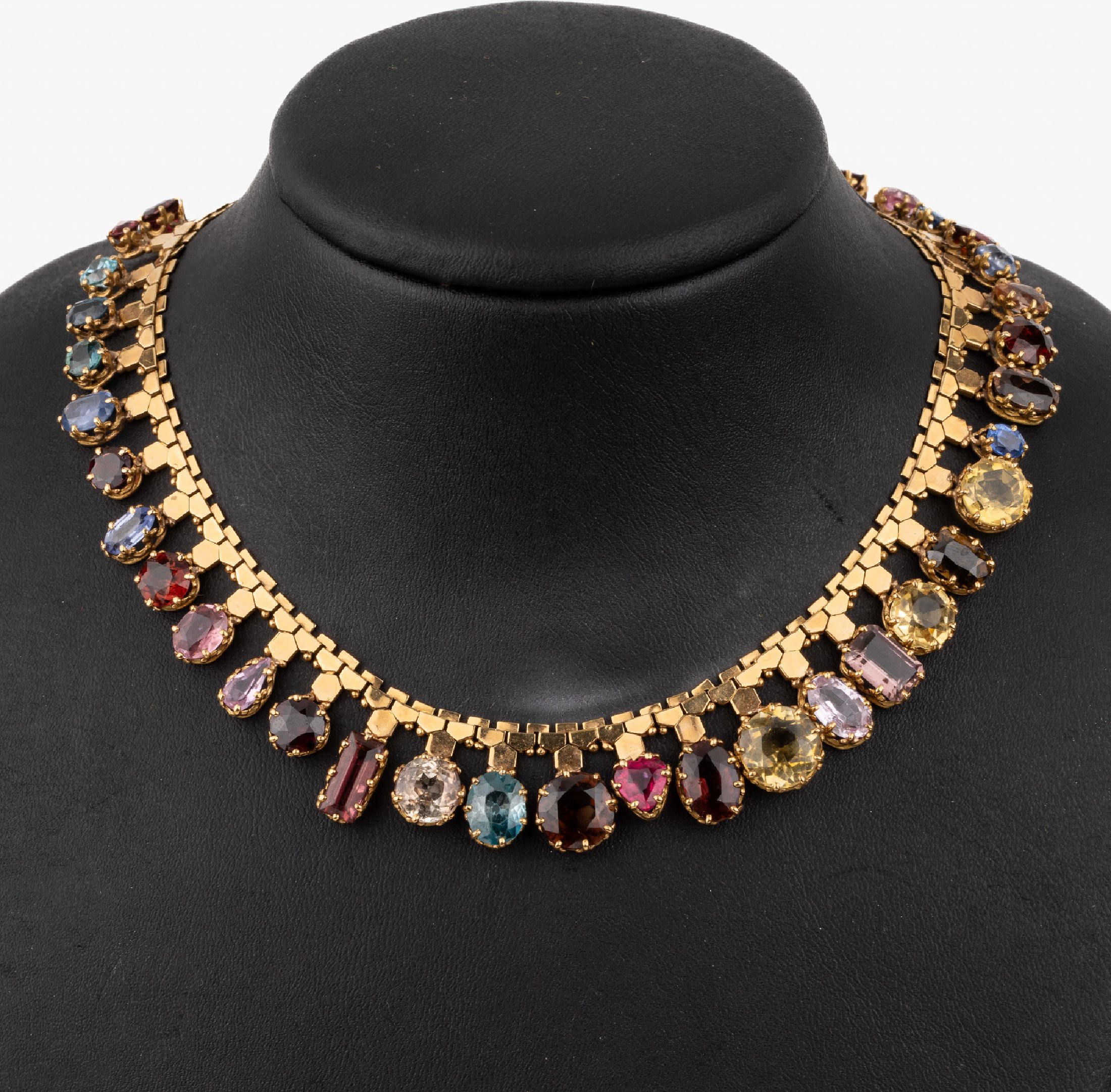 18 kt Gold Farbstein-Collier, GG 750/000, 33 facett. Farbsteine in versch. Formen und Größen u.a.: Citrine, Rubelithe, Granate, Rauchquarze, ...