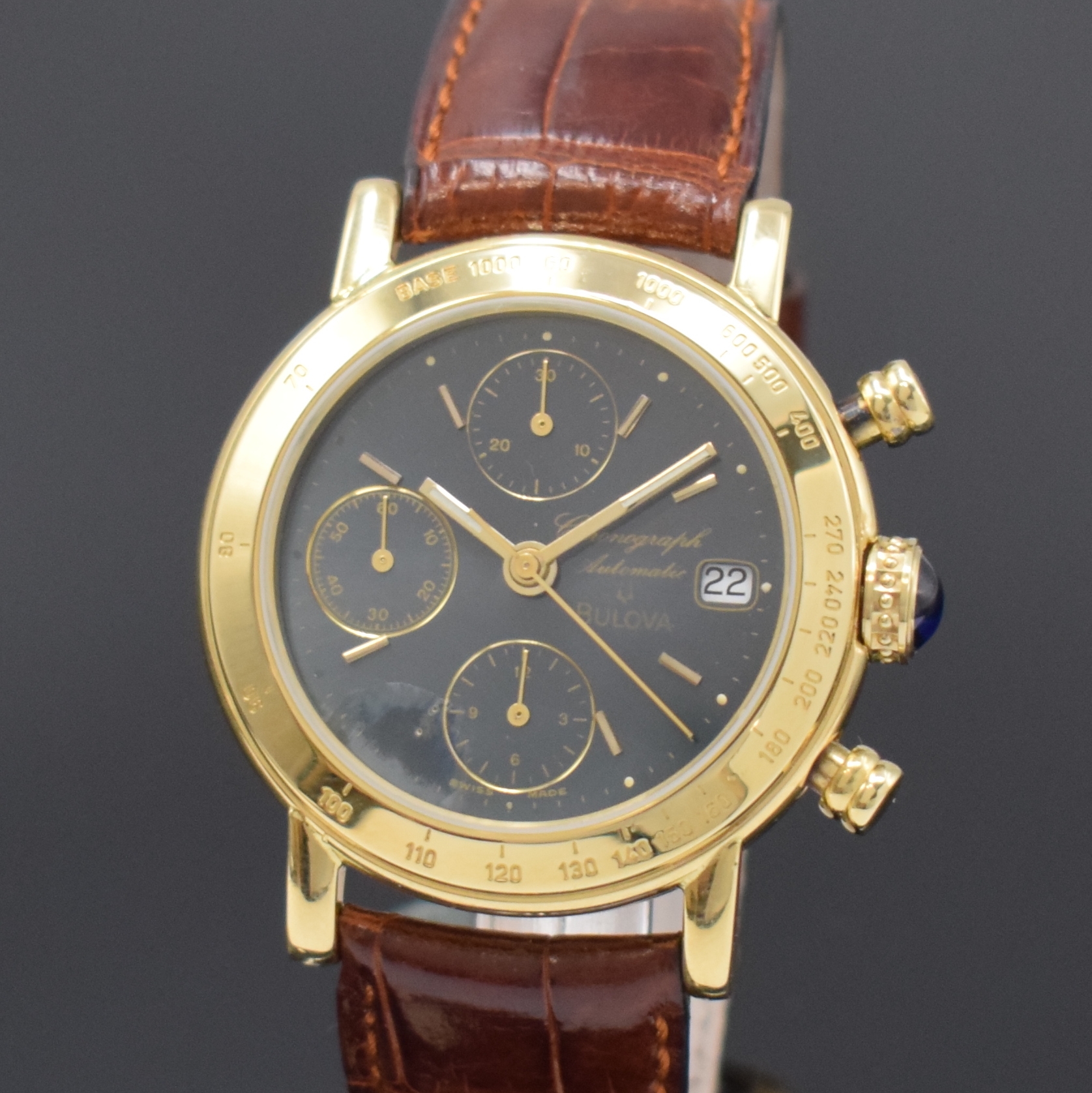 Detail a: BULOVA Armbandchronograph in GG 750/000, Schweiz um 2005, Automatik, Boden aufgedr., Lünette m. Tachymeterskala grav., Schmuckkrone, dunkelgraues ...