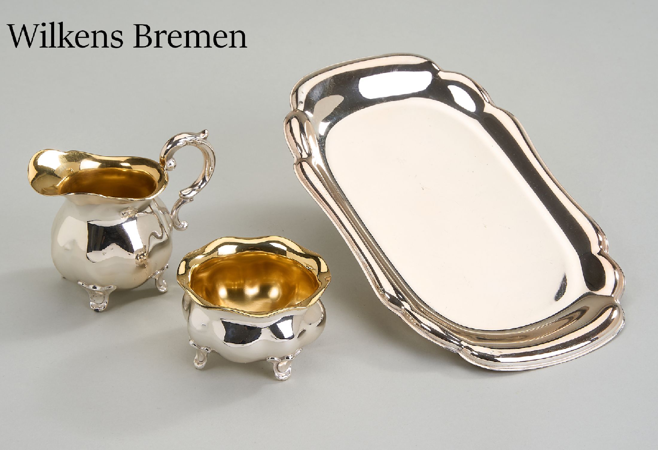 Silber Set, 835er Silber, deutsch, 1950er Jahre, 1 Sahnegießer und 1 Zuckergefäß, innen verg., 1 Tablett, ca. 20 x 13 cm, Hersteller ...