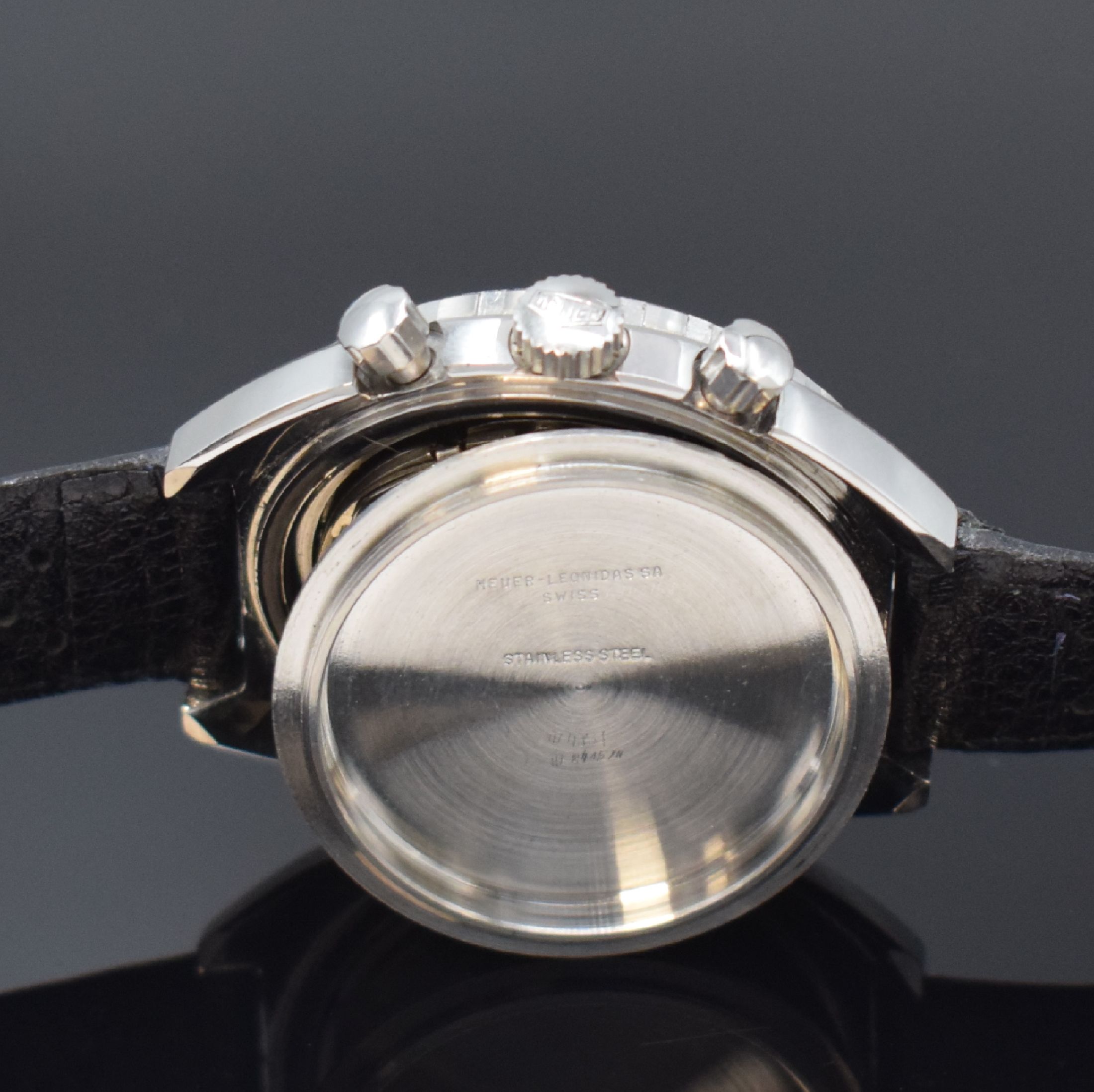 Detail e: HEUER Autavia Herrenchronograph Referenz 73463 in Stahl, Schweiz um 1972, Handaufzug, Lederband m. orig. Dornschl., Boden verschr., Lünette m. 60er ...