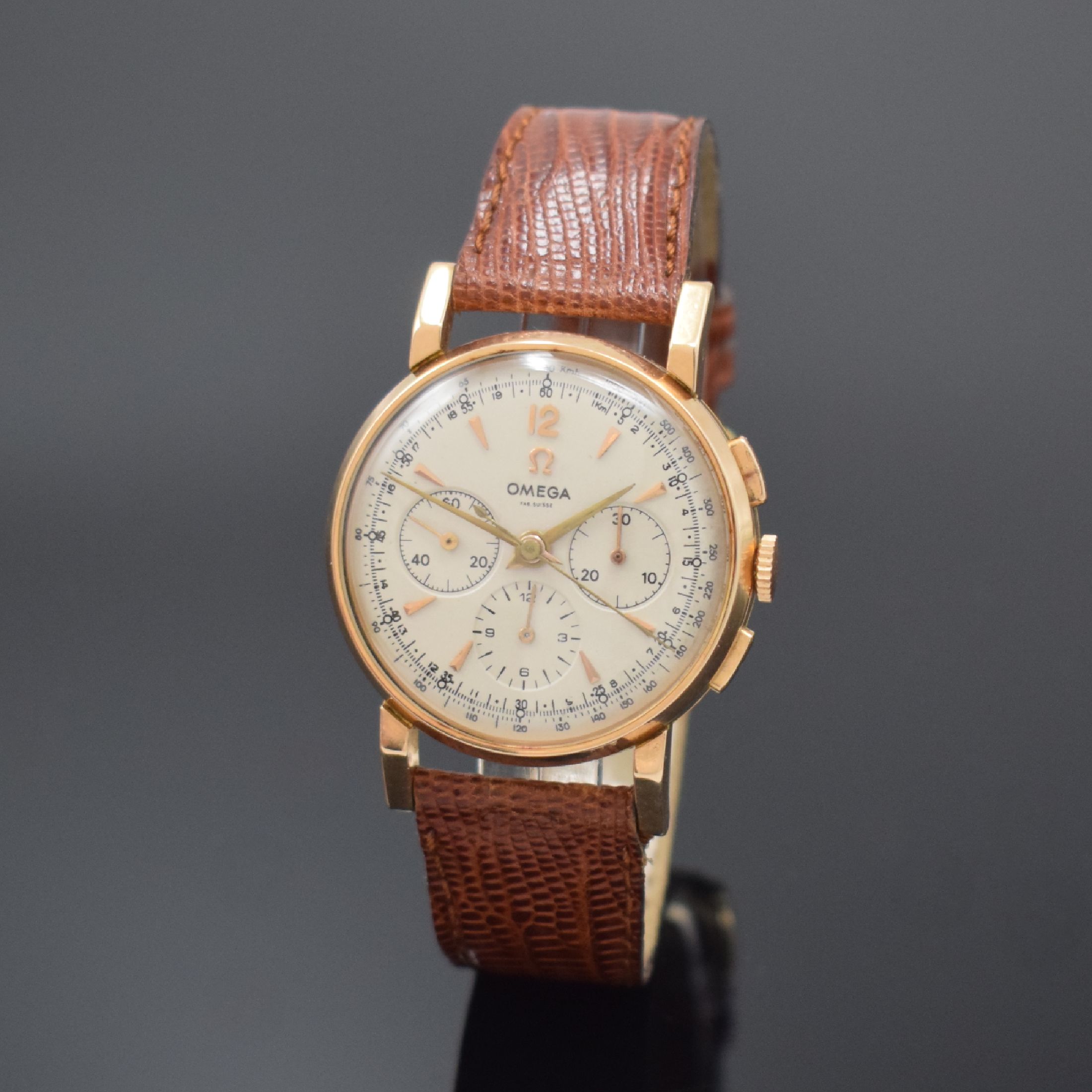 OMEGA Armbandchronograph mit Schaltrad in RG 750/000, Schweiz/Frankreich um 1950, Handaufzug, Boden aufgedr., silb. Zifferbl. rest., gold. Std.-Ind. ...