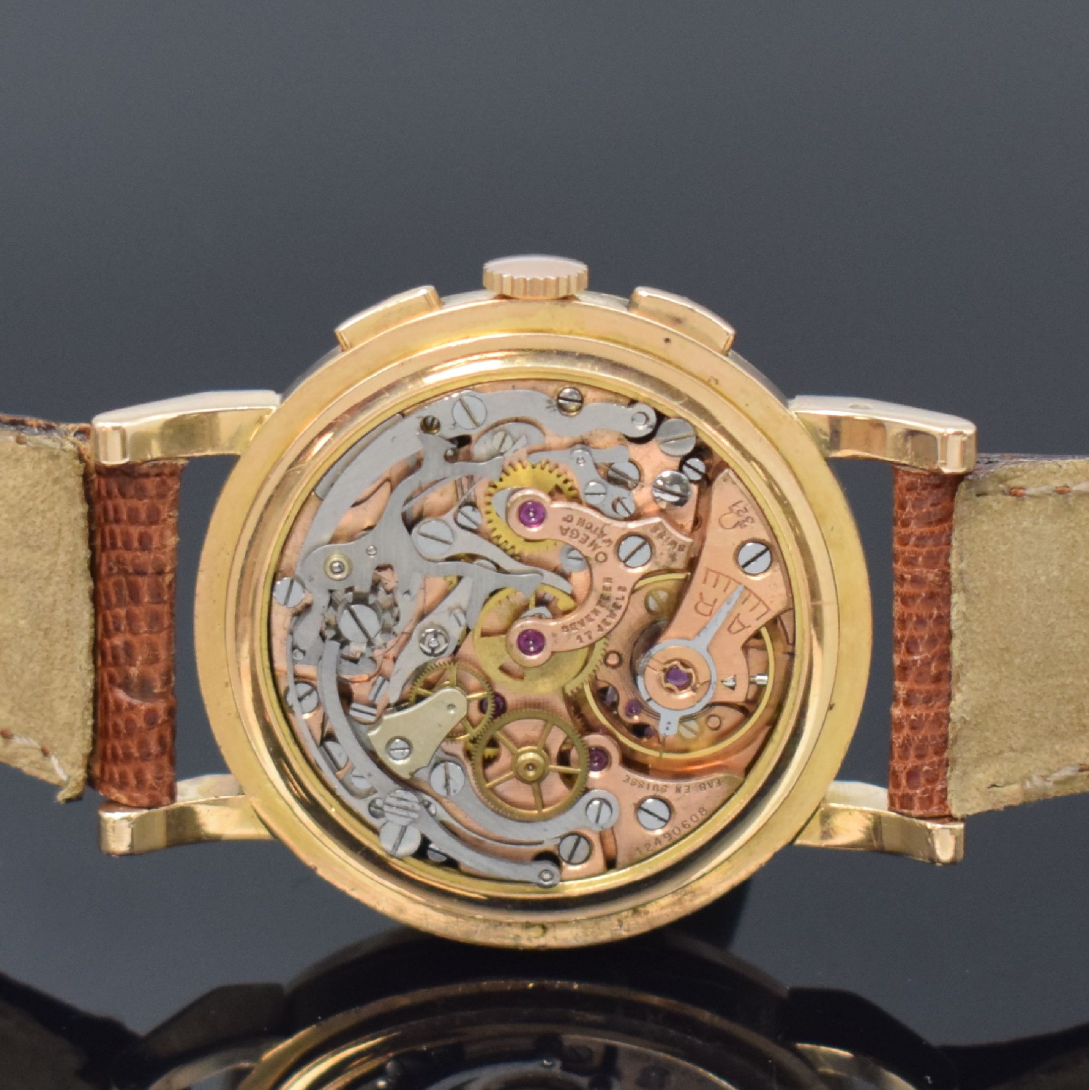 Detail d: OMEGA Armbandchronograph mit Schaltrad in RG 750/000, Schweiz/Frankreich um 1950, Handaufzug, Boden aufgedr., silb. Zifferbl. rest., gold. Std.-Ind. ...