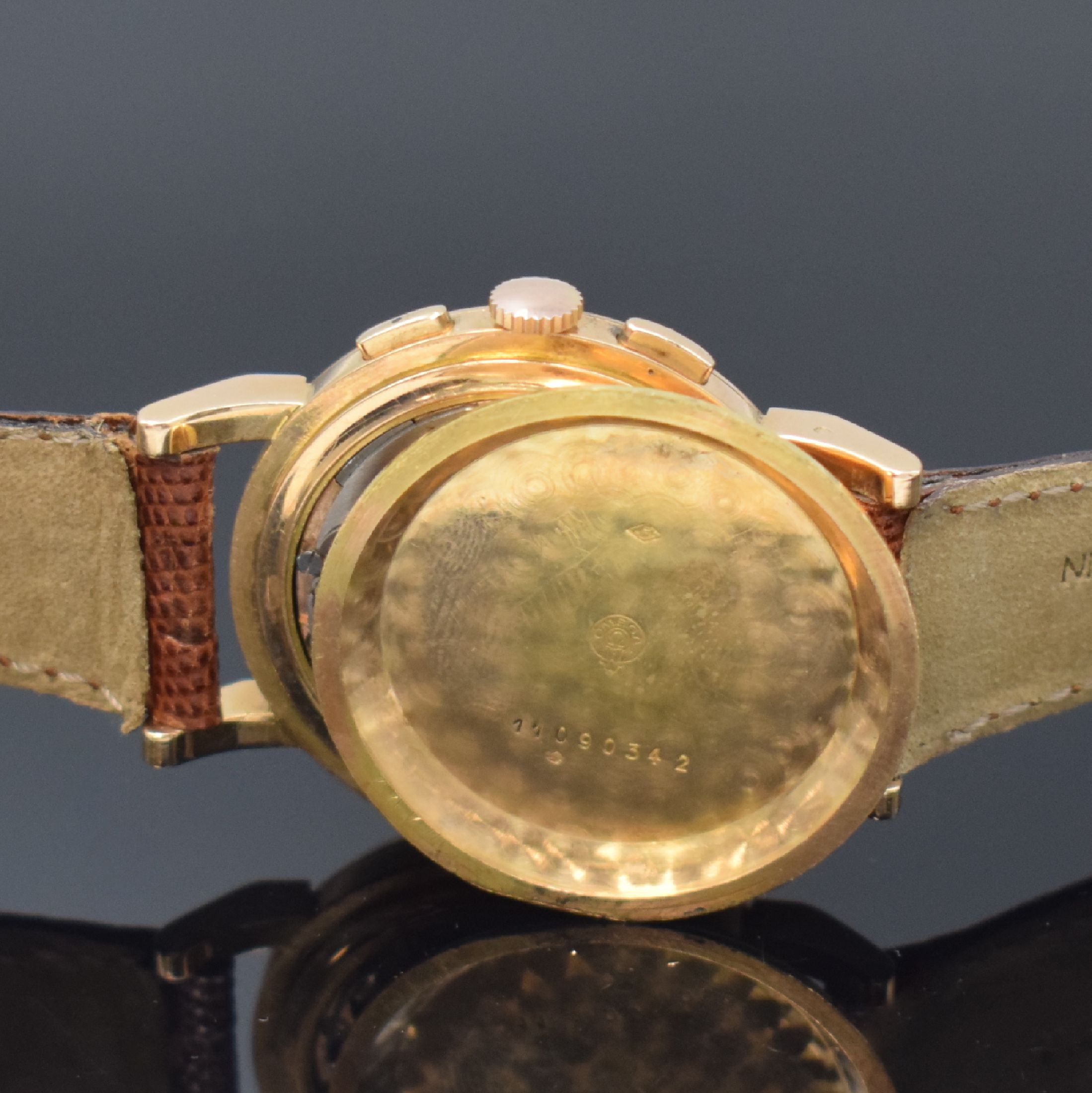 Detail e: OMEGA Armbandchronograph mit Schaltrad in RG 750/000, Schweiz/Frankreich um 1950, Handaufzug, Boden aufgedr., silb. Zifferbl. rest., gold. Std.-Ind. ...