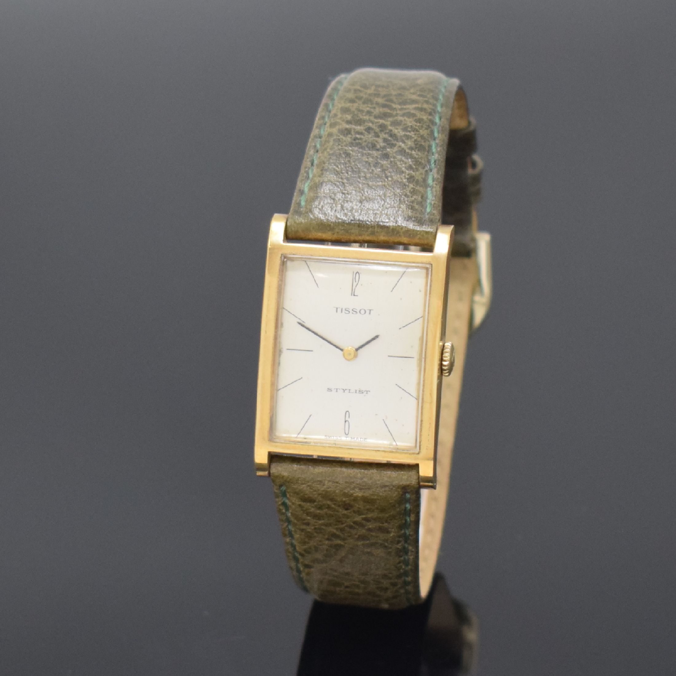 TISSOT Stylist Armbanduhr in GG 585/000, Schweiz um 1965, Handaufzug, 2-teil. Geh., Boden aufgedr., silb. Zifferbl. pat./fl., geschw. Zeiger, rhod. ...