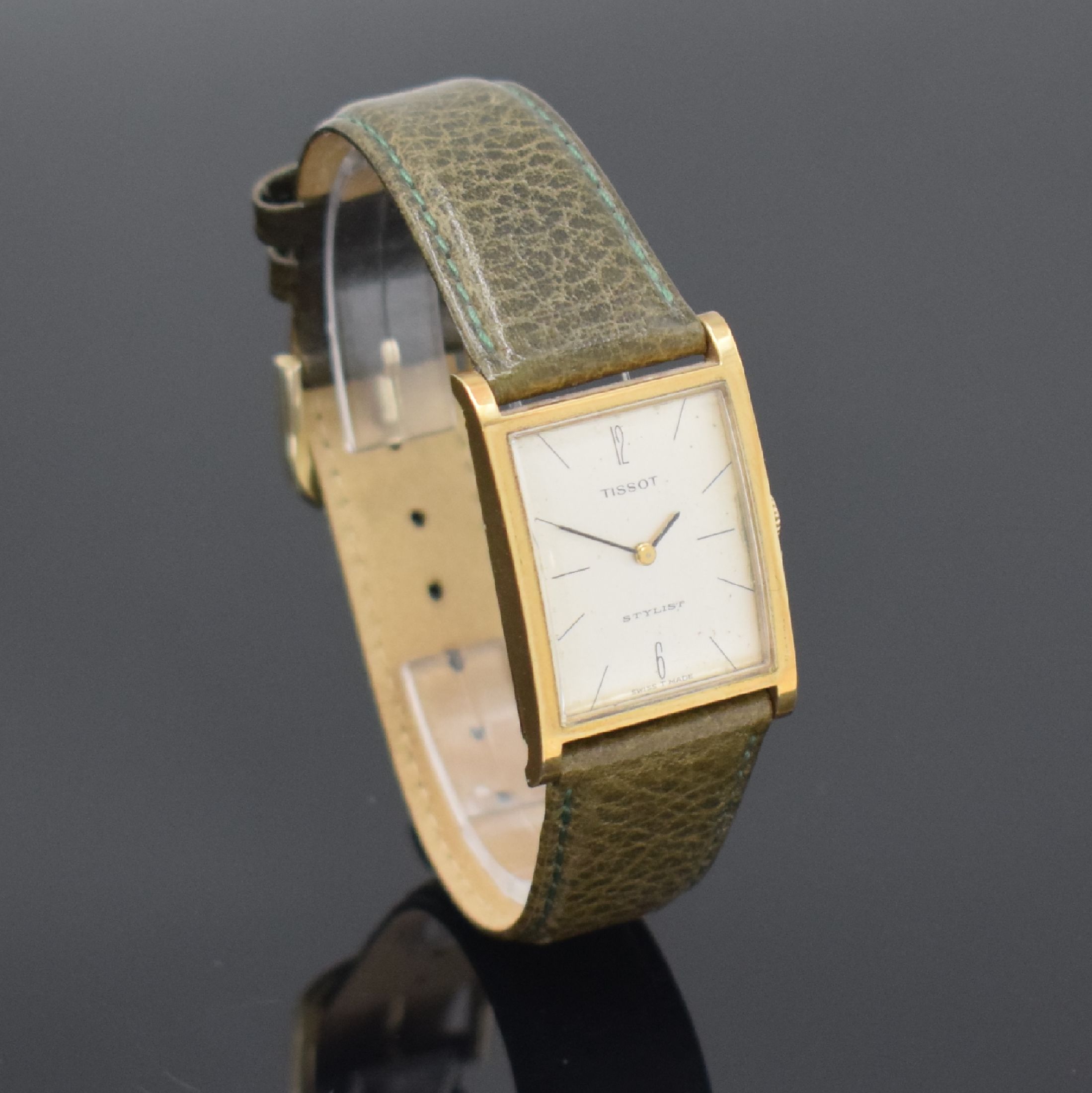 Detail b: TISSOT Stylist Armbanduhr in GG 585/000, Schweiz um 1965, Handaufzug, 2-teil. Geh., Boden aufgedr., silb. Zifferbl. pat./fl., geschw. Zeiger, rhod. ...
