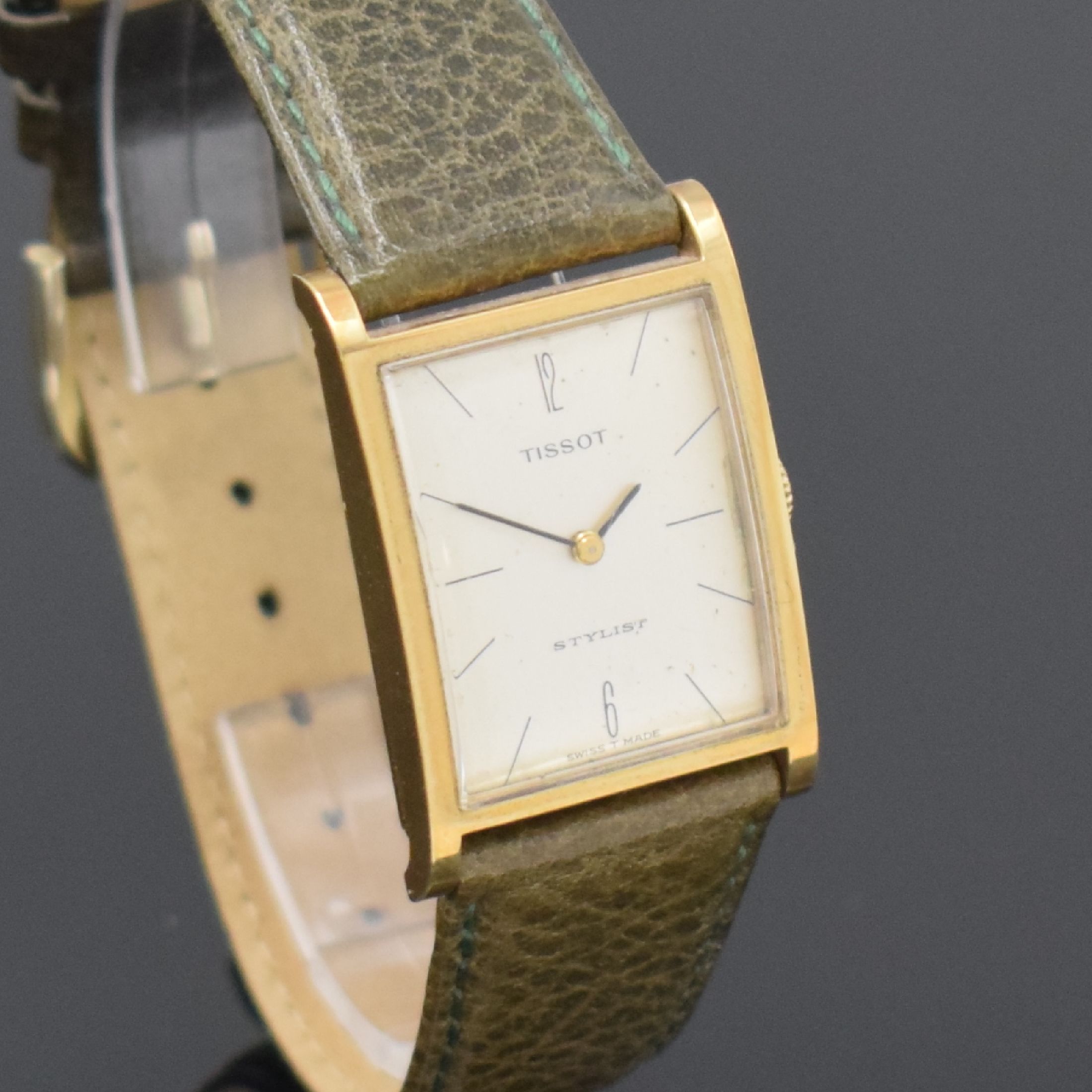 Detail c: TISSOT Stylist Armbanduhr in GG 585/000, Schweiz um 1965, Handaufzug, 2-teil. Geh., Boden aufgedr., silb. Zifferbl. pat./fl., geschw. Zeiger, rhod. ...