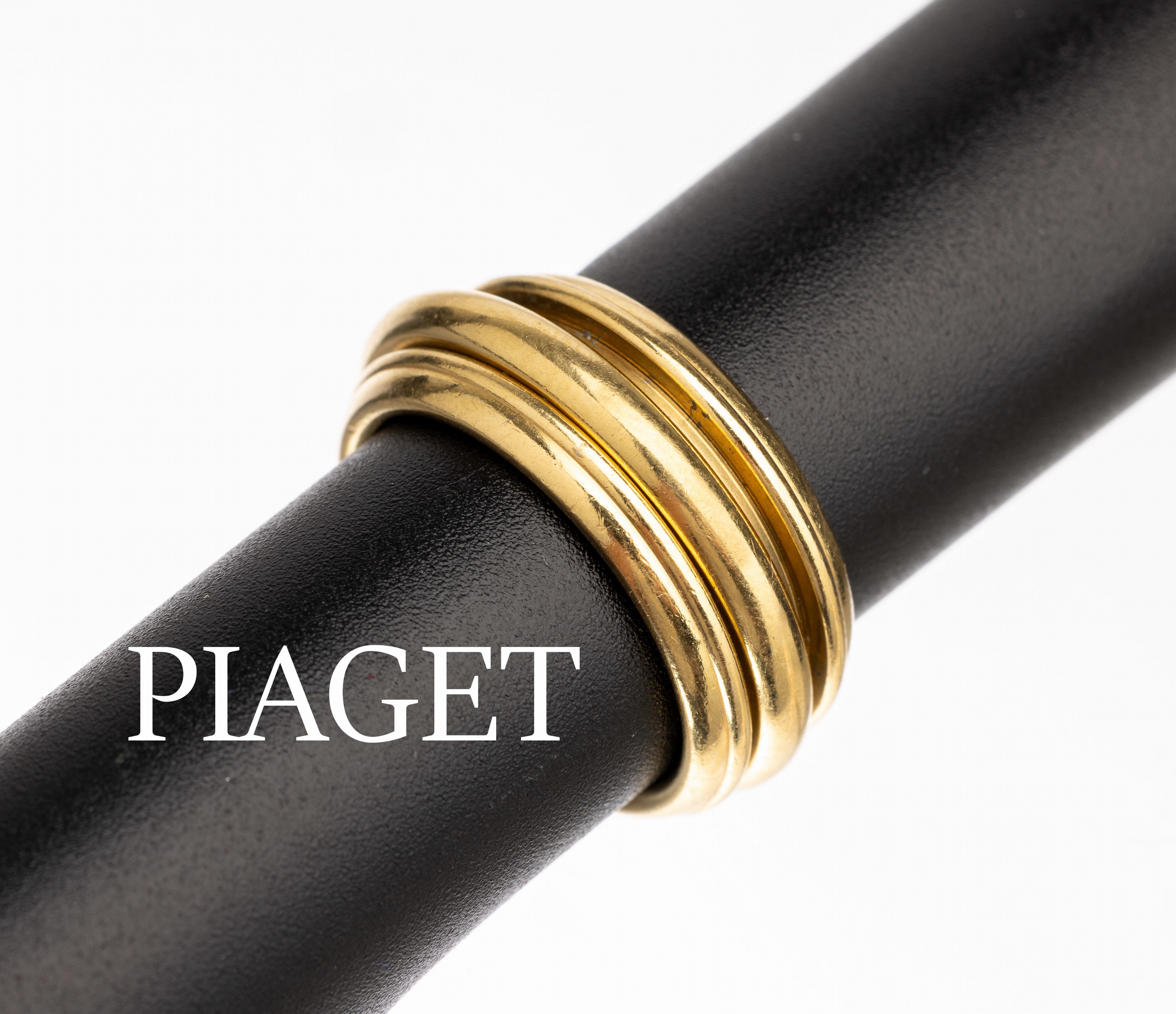 18 kt Gold PIAGET Ring, GG 750/000, Modell Possession, Mittelschiene drehbar, ca. 13.7 g, sign., dat., RW 55, orig. Etui