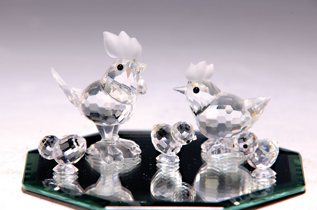 5 Swarovski-Figuren, Hahn, Henne und drei Küken, facettiertes Kristallglas, H. ca. 1.5- 4.5cm