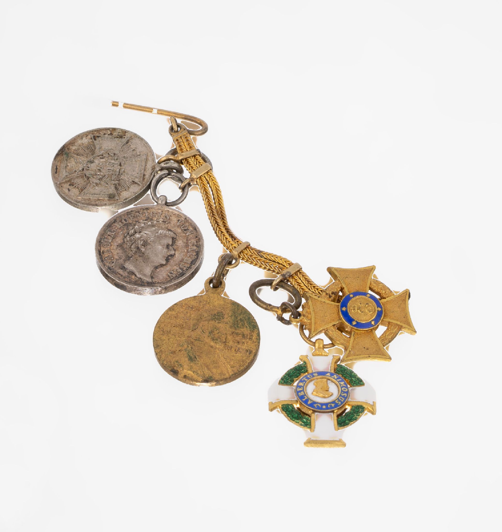 Detail a: Konvolut Orden, 1 x Ehrenkreuz für freiwillige Wohlfahrtspflege 1914/18, an Ripsband, 1 kl. Ordensspange mit 2 Miniaturorden und 3 Miniaturmedaillen
