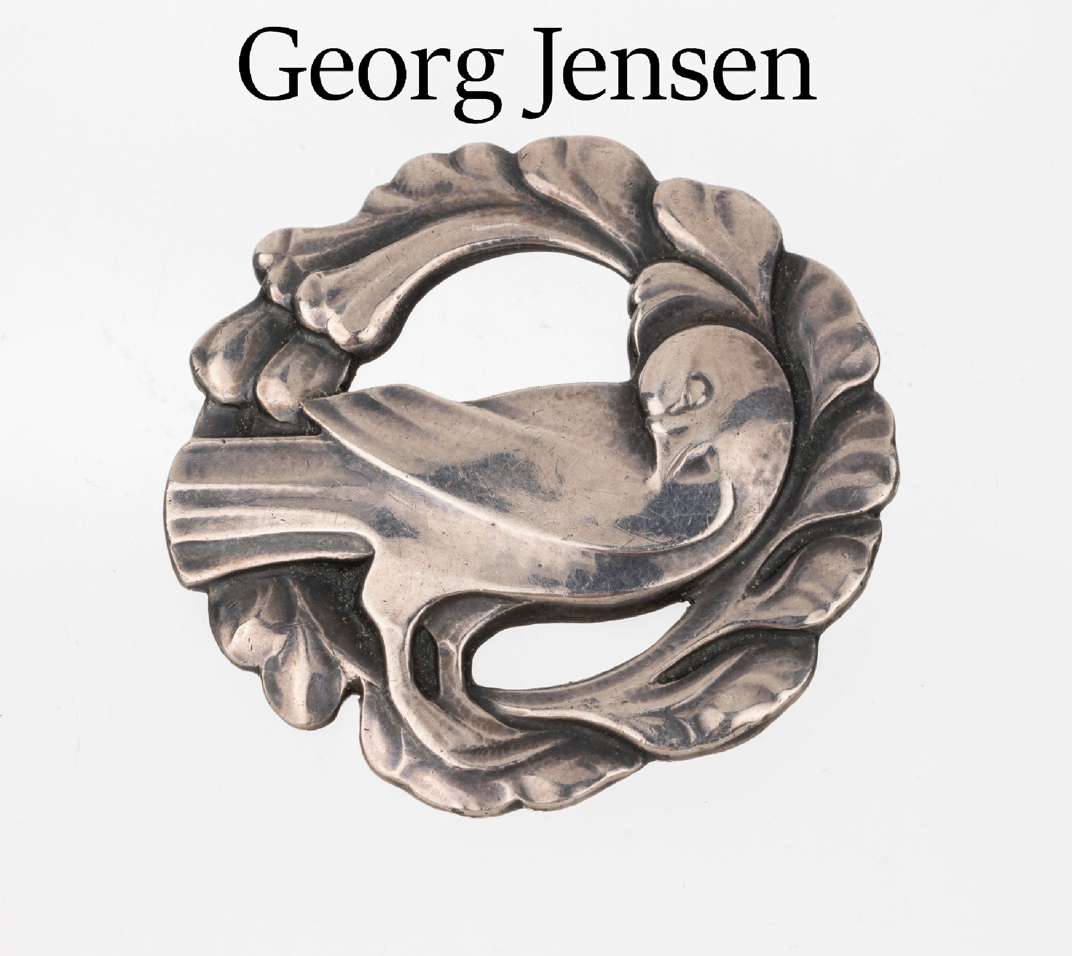 GEORG JENSEN Brosche, Dänemark um 1915-27, Modell 423, Darstellung einer Taube, durchbrochen gearbeitet, D ca. 4.5 cm, Lit.: Georg Jensen, a ...