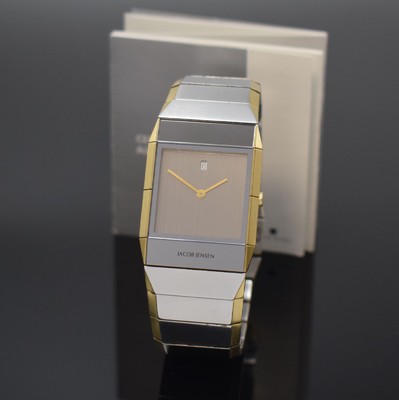 Image 26745184 - JACOB JENSEN design-wristwatch reference 553 in steel, Switzerland according to original papers sold in 2018, quartz, rectangular case, integrated solid bracelet with butterfly clasp, bracelet and case with gold plated edges, silvered dial, gilded hands, date at 12, measures approx. 38,5 x 30 mm, length approx. 19 cm, condition 2