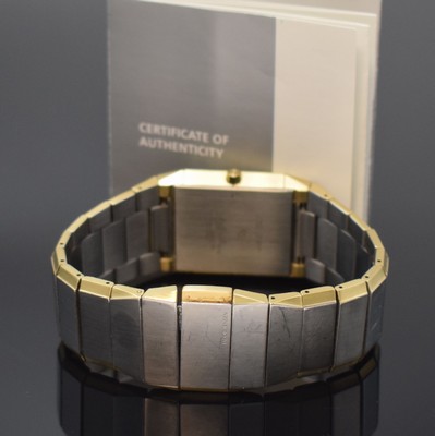 26745184b - JACOB JENSEN design-wristwatch reference 553 in steel, Switzerland according to original papers sold in 2018, quartz, rectangular case, integrated solid bracelet with butterfly clasp, bracelet and case with gold plated edges, silvered dial, gilded hands, date at 12, measures approx. 38,5 x 30 mm, length approx. 19 cm, condition 2