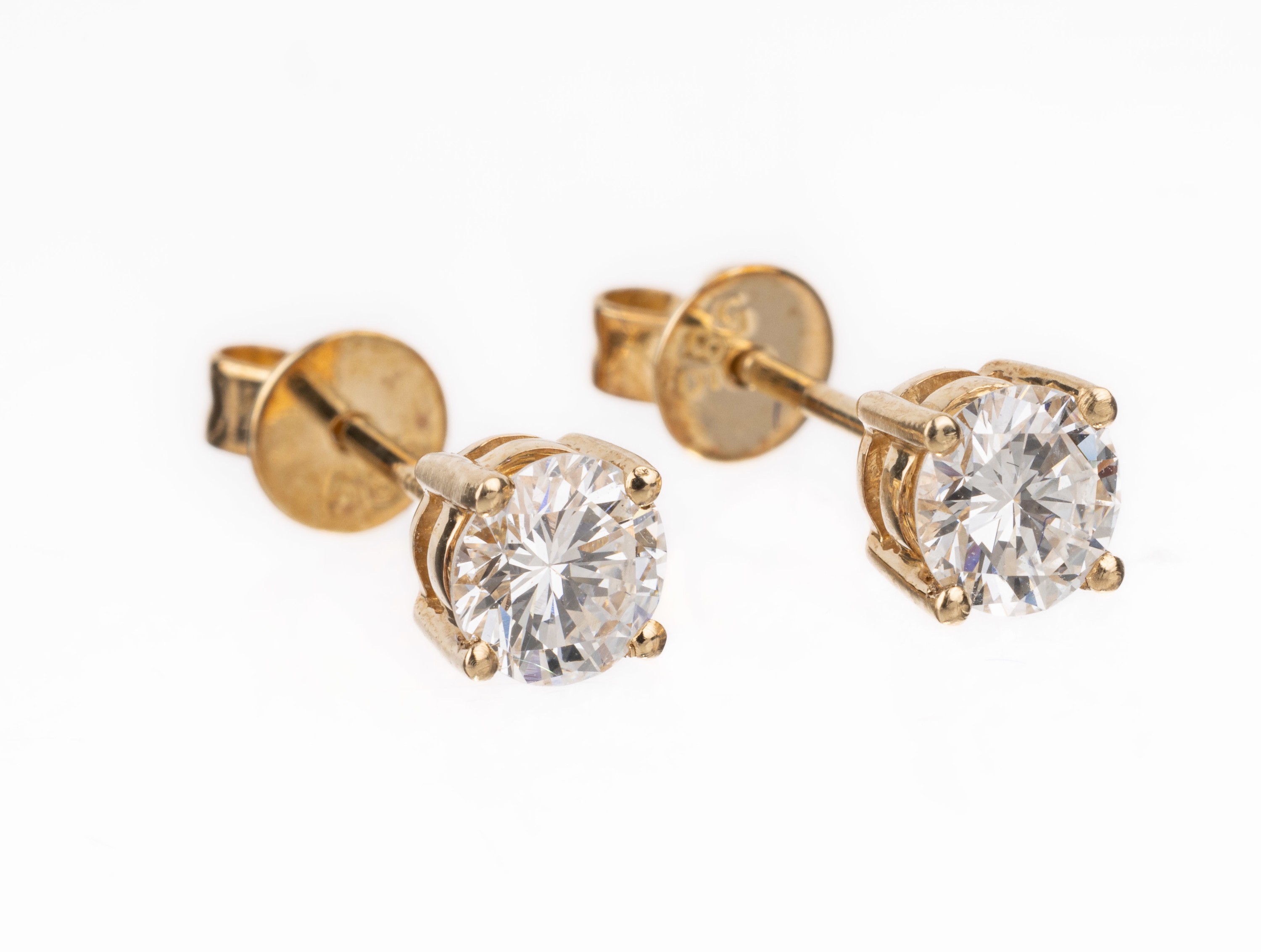 Paar 14 kt Gold Brillant-Ohrstecker, GG 585/000, 2 Brillanten zus. ca. 0.74 ct Weiß/vs