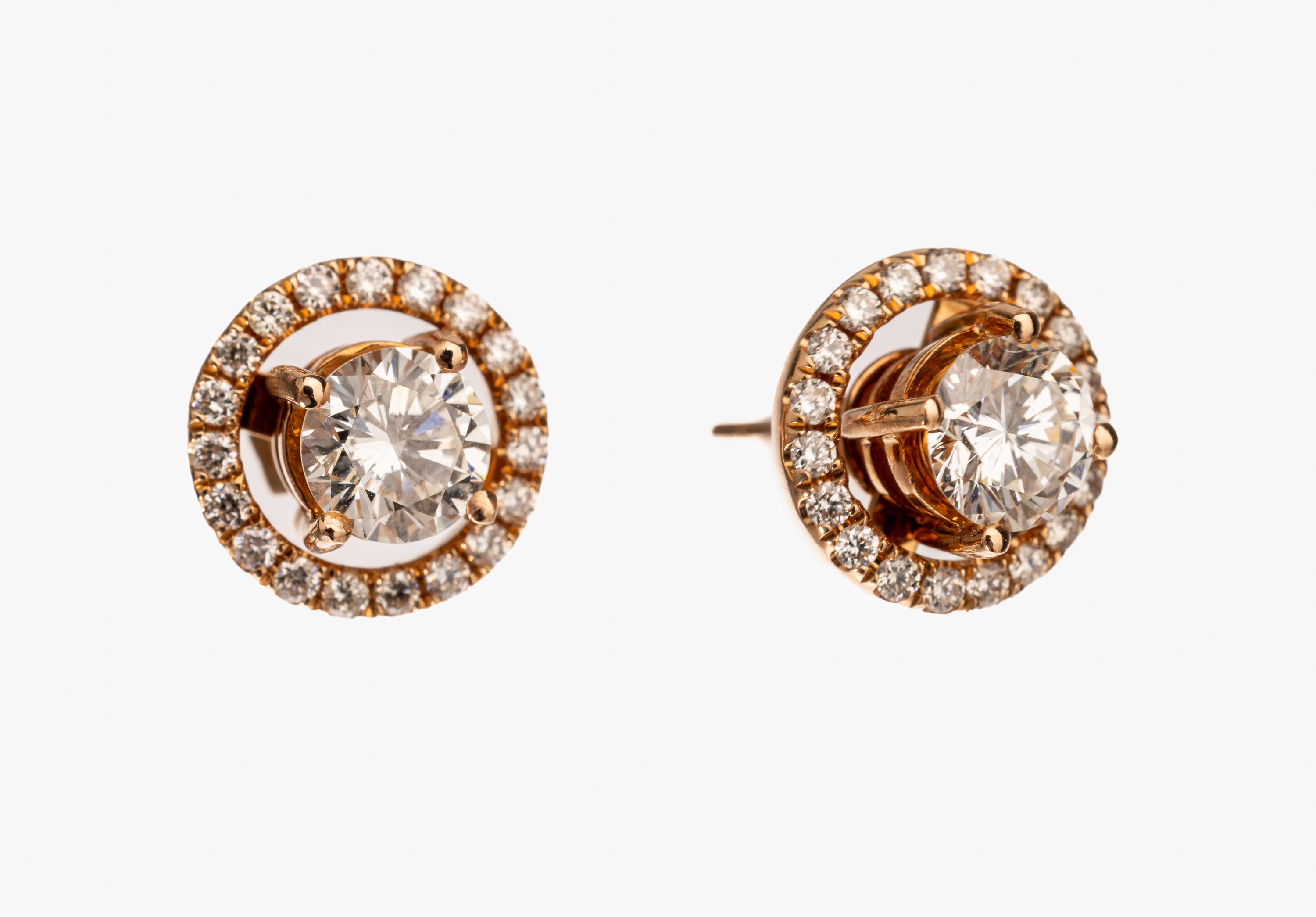 Paar 18 kt Gold Brillant-Ohrstecker, RG 750/000, 2 Brillanten zus. ca. 1.03 ct Weiss/vs, abnehmbare Kränze mit 40 Brillanten zus. ca. 0.33 ct ...