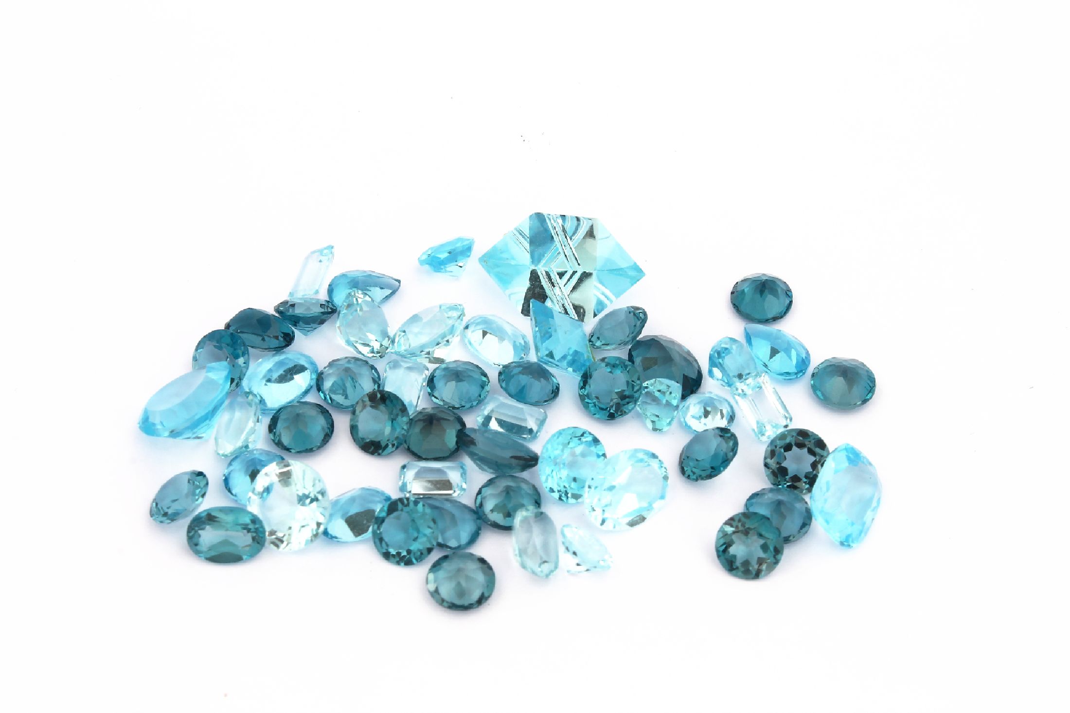 Lot lose Topase, ca. 64.19 ct, versch. Schliffformen, Größen und Farbnuancen