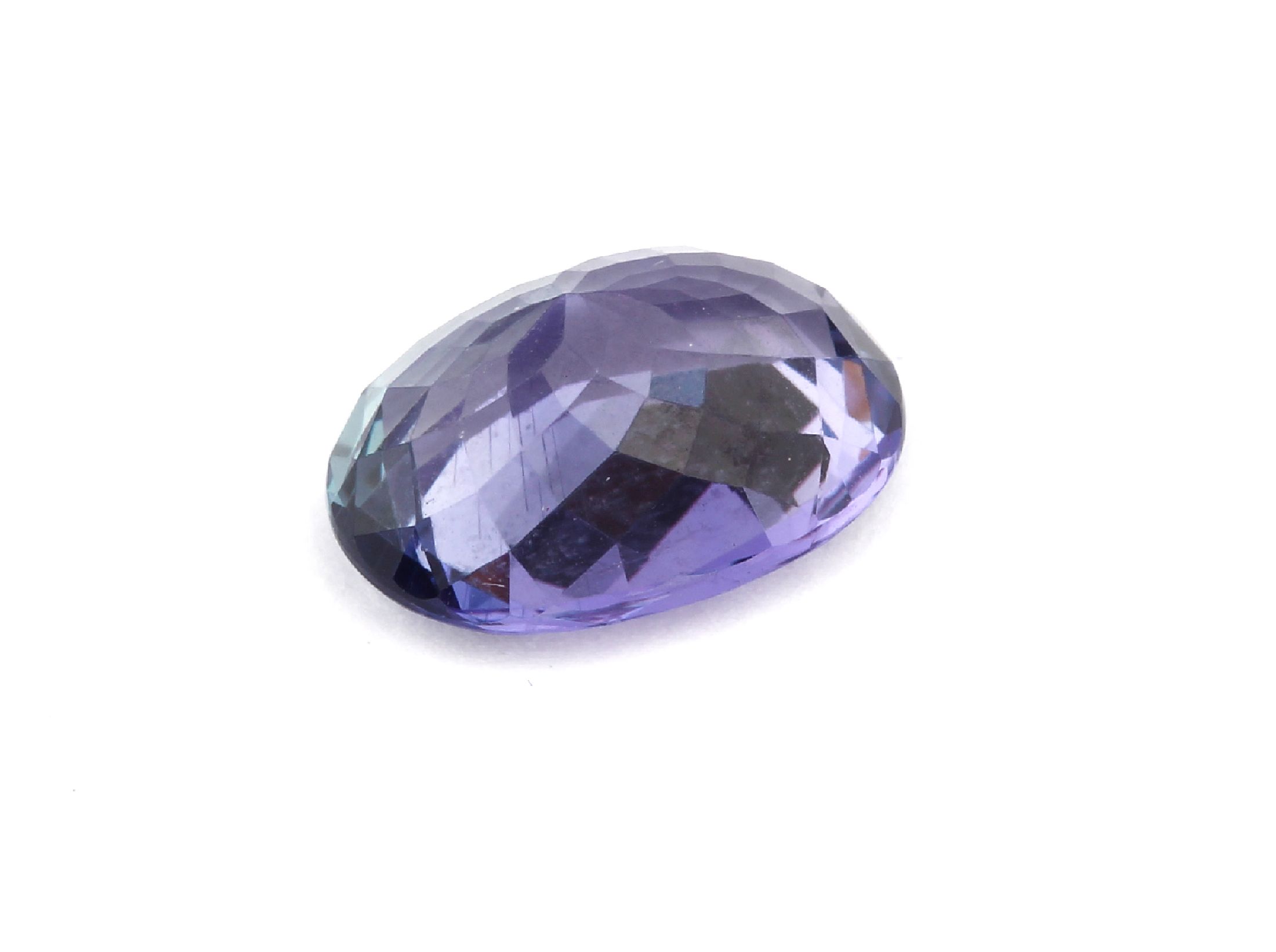 Detail a: Loser Tansanit, ca. 4.68 ct, ovalfacett., mit PGTL-Expertise