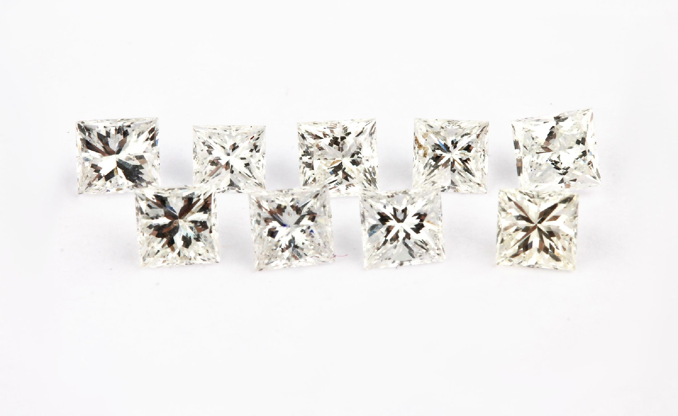 Lot 9 lose Diamanten im Princesscut, ca. 2.24 ct feines Weiß-Weiß/si-vs