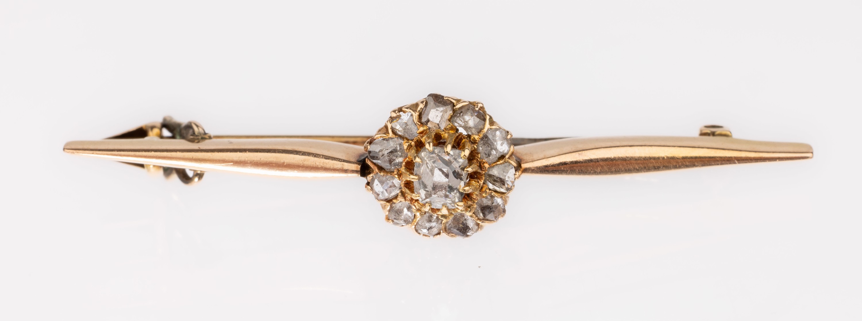 14 kt Gold Diamant-Brosche, um 1890, GG 585/000, 12 Diamantrosen zus. ca. 0.28 ct, L. ca. 4.5 cm, ca. 4.2 g