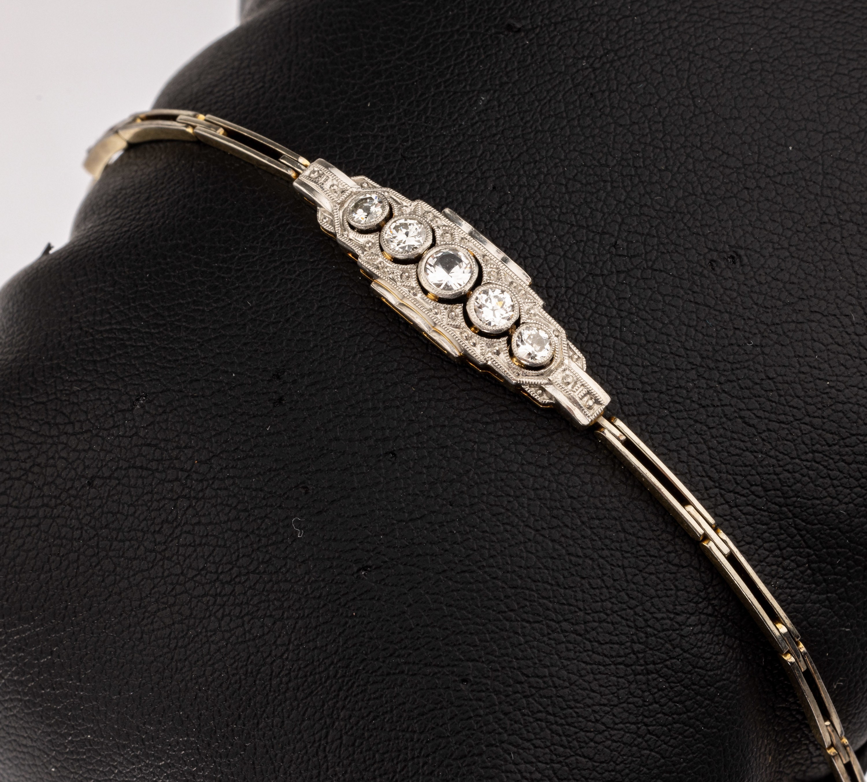 14 kt Gold Art Deco Diamant-Armband, GG 585/000 gepr., um 1930, schauseitig plat., Mittelteil mit 5 Brillanten und Altschliffdiamanten zus. ca. 0.34 ...