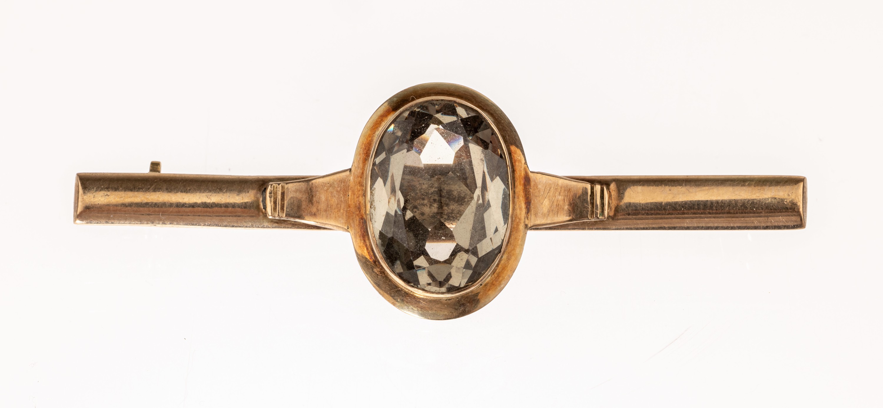 8 kt Gold Farbstein-Brosche, GG 333/000, 1930/40er Jahre, L. ca. 6.2 cm, ovalfacett. synth. Spinell, ca. 8.9 g, urspr. Ring