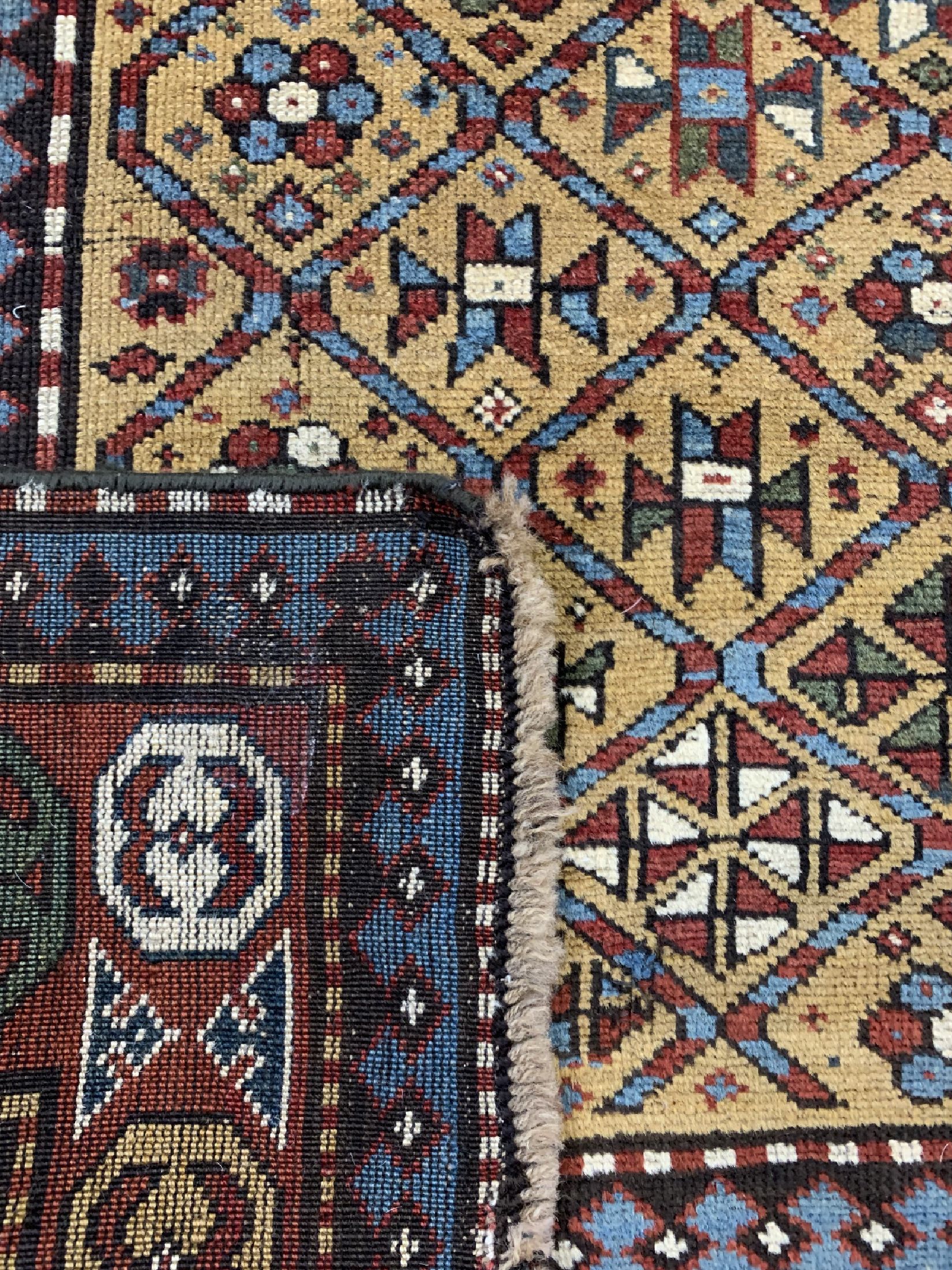 Detail e: Antiker Kazak, Kaukasus, 19.Jhd, Wolle auf Wolle, ca. 250 x 130 cm, EHZ: 2, (minimal restauriert)