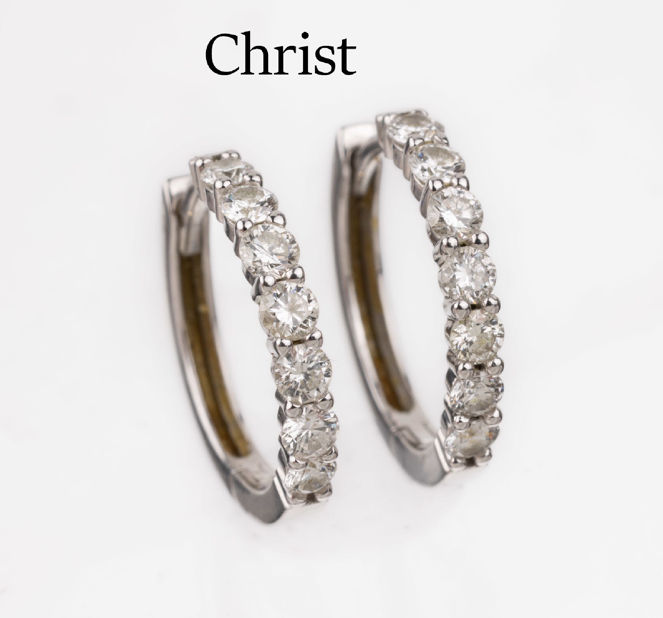 Paar 14 kt Gold CHRIST Brillant-Creolen, WG585/000, 14 Brillanten zus. ca. 0.70 ct Weiß/vs-si, ca. 2.6 g, sign.